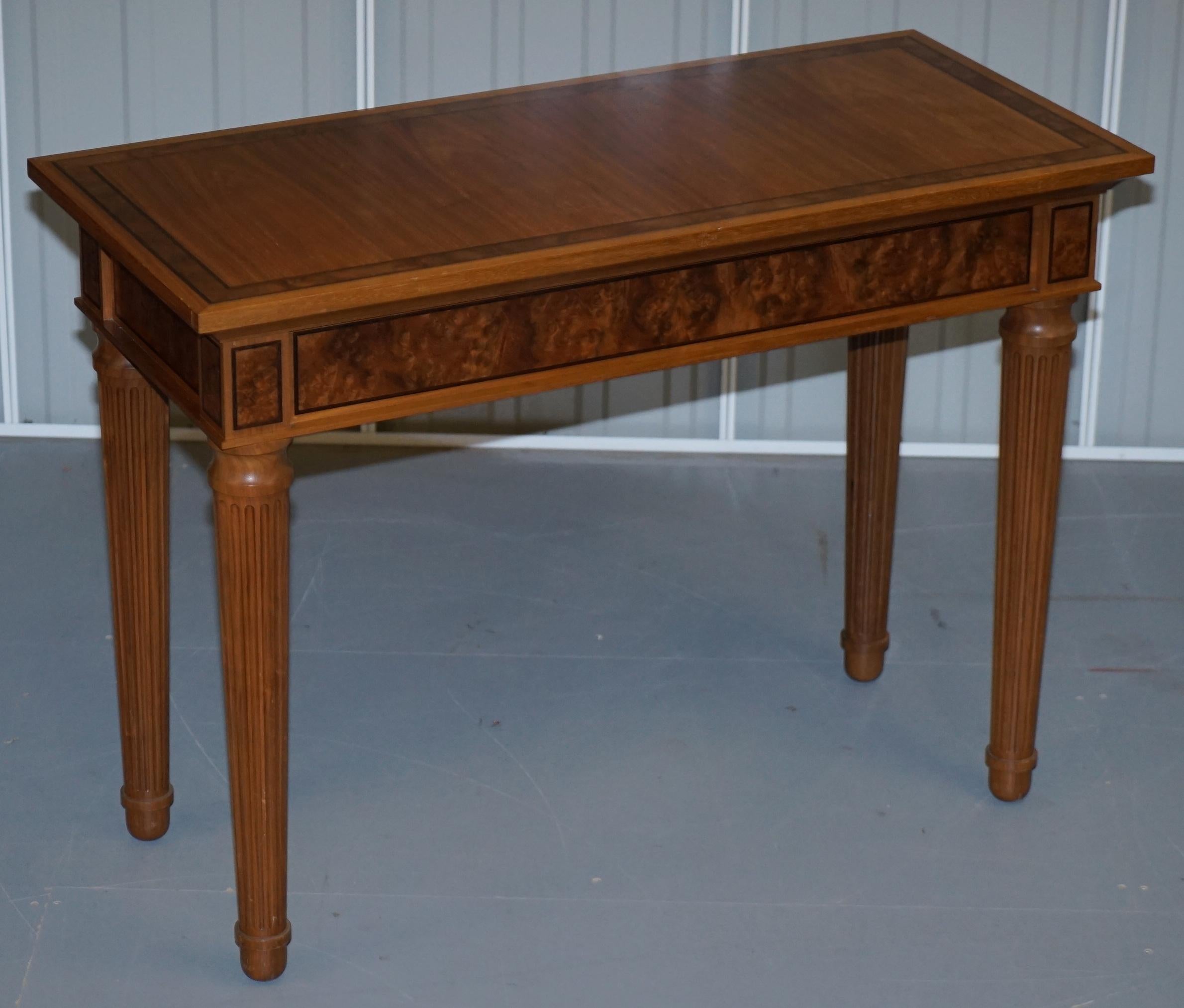 We are delighted to offer for sale this absolutely stunning pair of David Linley burr walnut ebony and American black walnut console tables RRP £24,000

A very rare and collectable pair of tables, these are now discontinued but are stamped David