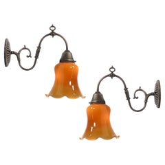 Antique Matching Pair of Decorative Amber Over Milk Glass Tulip Sconces