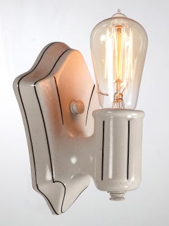Matching Pair of Early Deco Porcelain Sconces