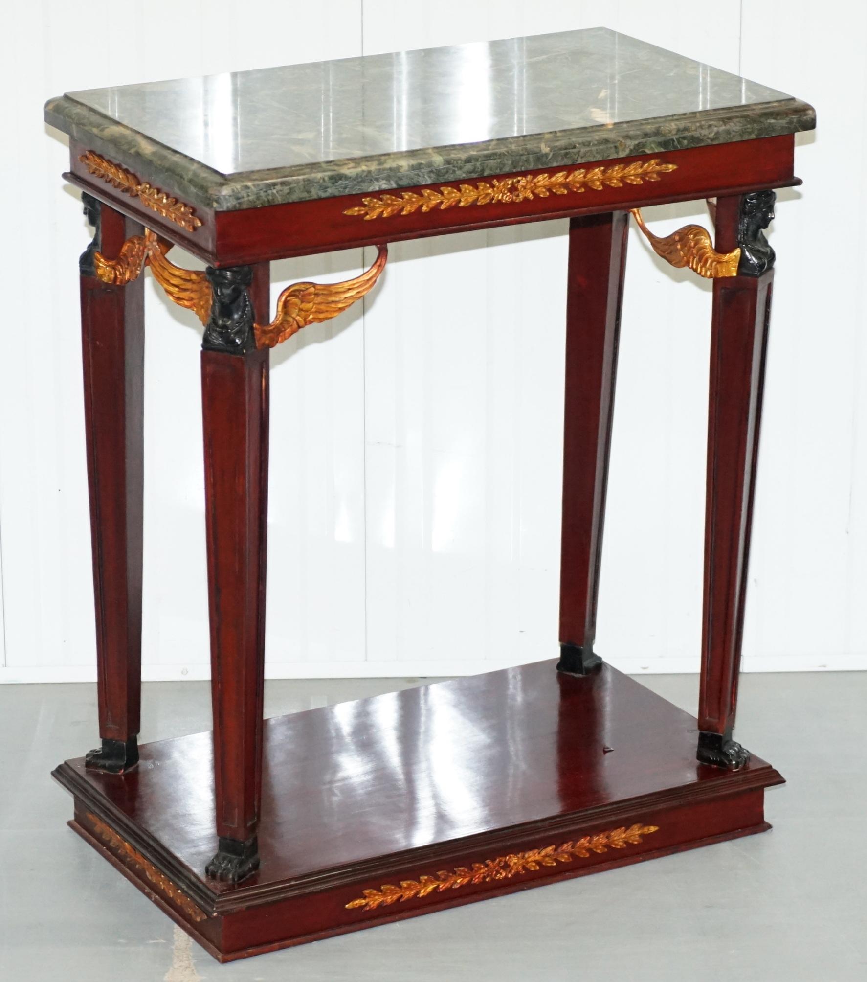 We are delighted to offer for sale this pair of vintage French Empire style thick marble topped console tables

A very good looking and decorative pair, the marble tops are removable and very solid, I would estimate them to weigh around 50kgs