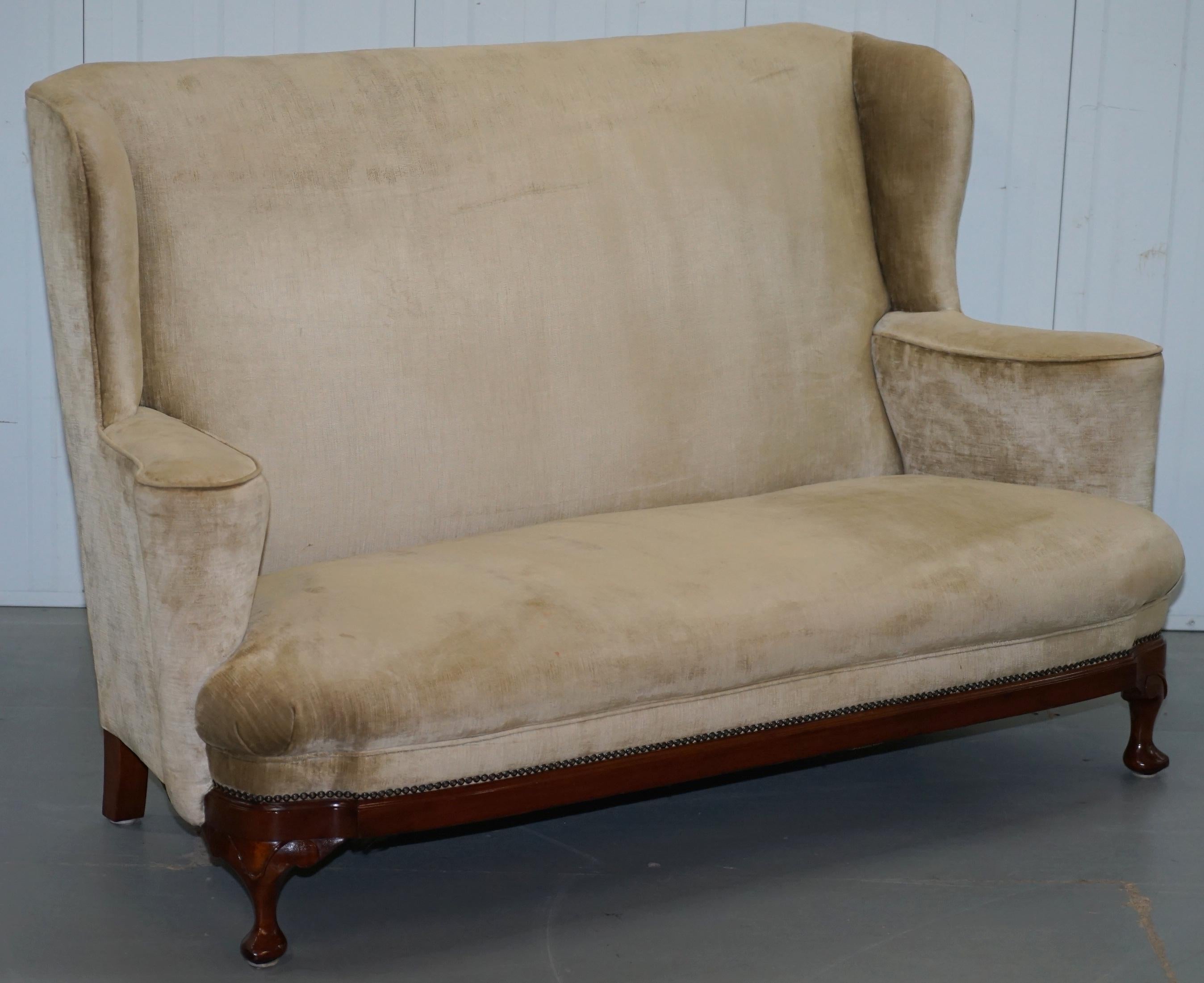 We are delighted to offer for sale this lovely pair of early Victoria Settees made in the George I style with walnut and mahogany frames

A very good looking and a well-made pair in ready to go order, they are a very rare model the flat top arms