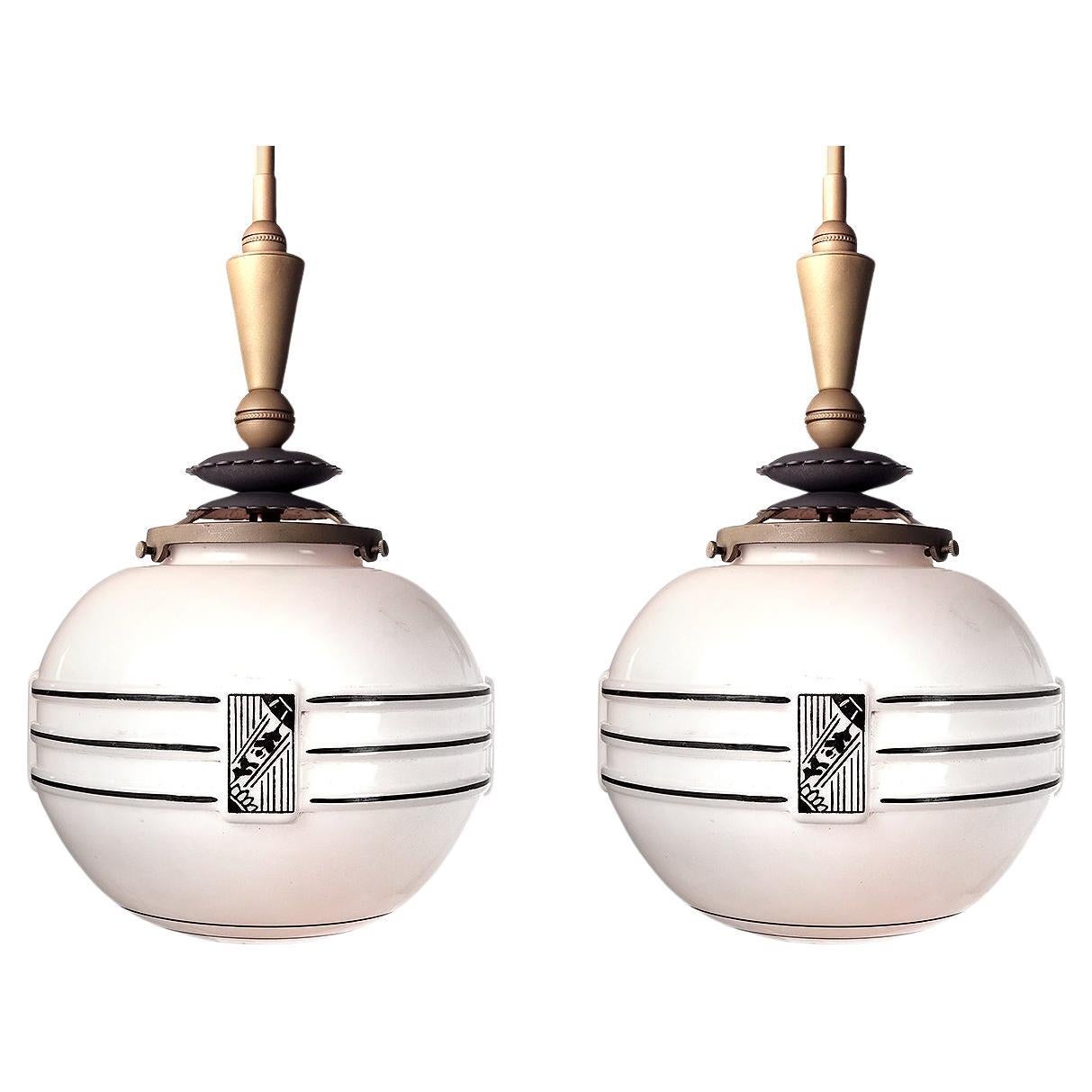 Matching Pair of High Style Art Deco Globe Pendents For Sale