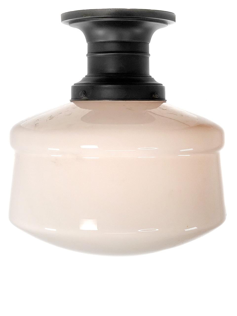 This are the real thing... early school house lamps. This is about as large as they came and in a unique style that you don't see reproduced. This is an impressive pair of milk glass fixtures.