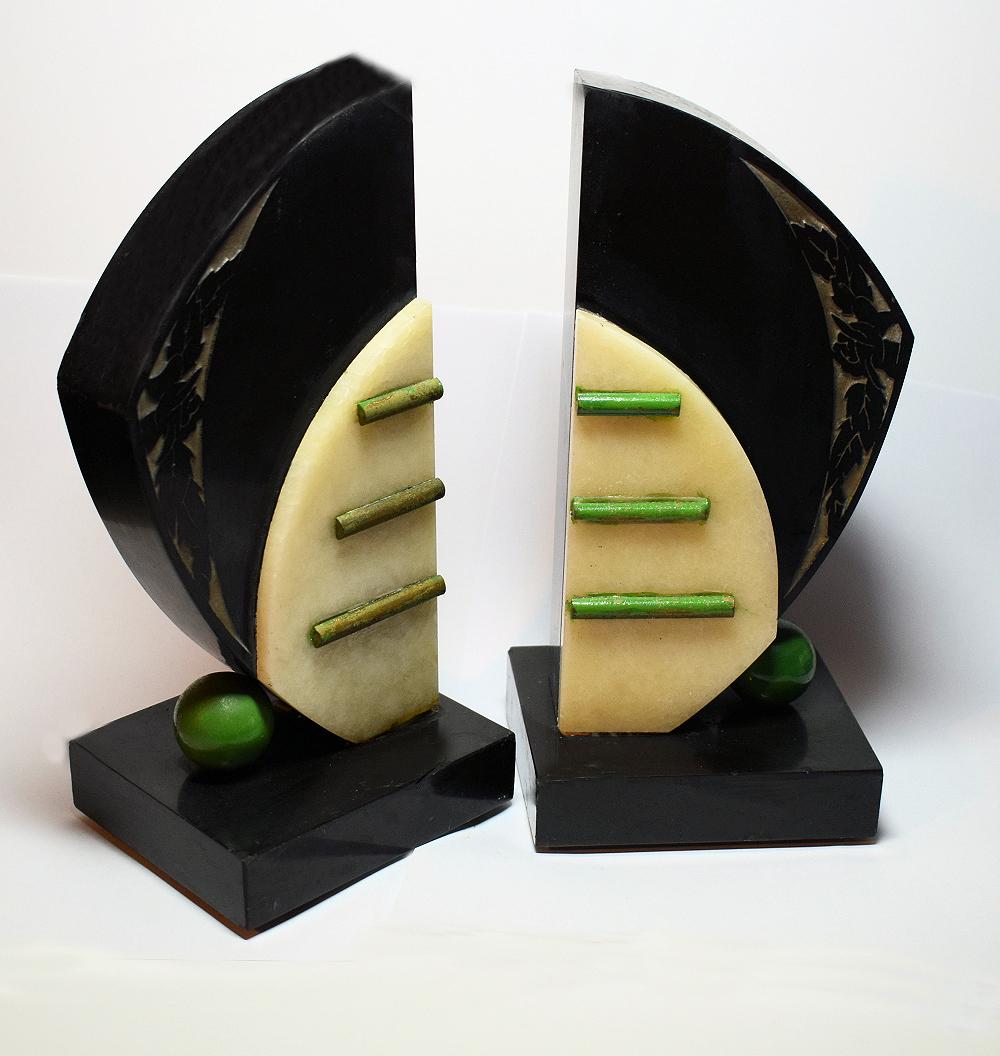 Impressive 1930s pair of Art Deco modernist original solid marble bookends in a great geometric shape. Super size, much larger than normal and so ideal for modern use and extremely heavy enough to support the weightiest of book collections and stop