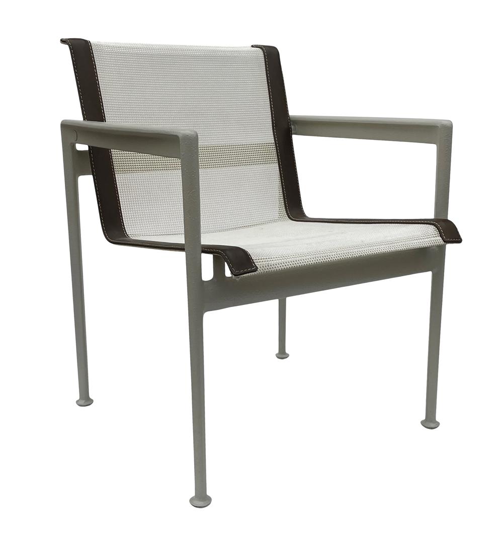 A matching pair of Richard Schultz patio chairs from the 1966 collection and produced by Knoll. These chairs features grey powder coated aluminum frames with white slings with brown trim.