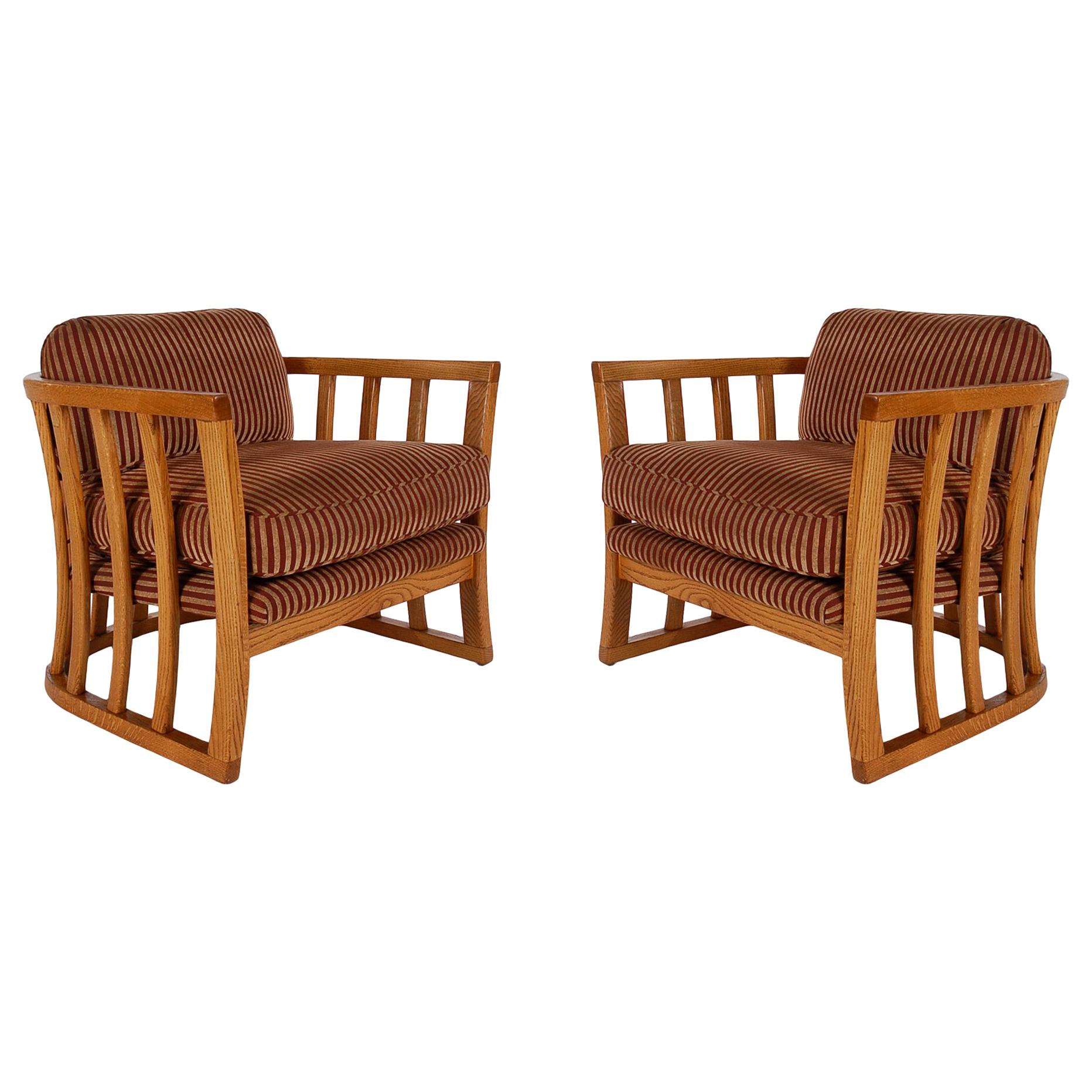 Matching Pair of Mid-Century Modern Spindle Back Barrel Lounge Chairs in Oak