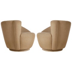 Matching Pair of Nautilus Swivel Lounge Chairs by Vladimir Kagan for Preview