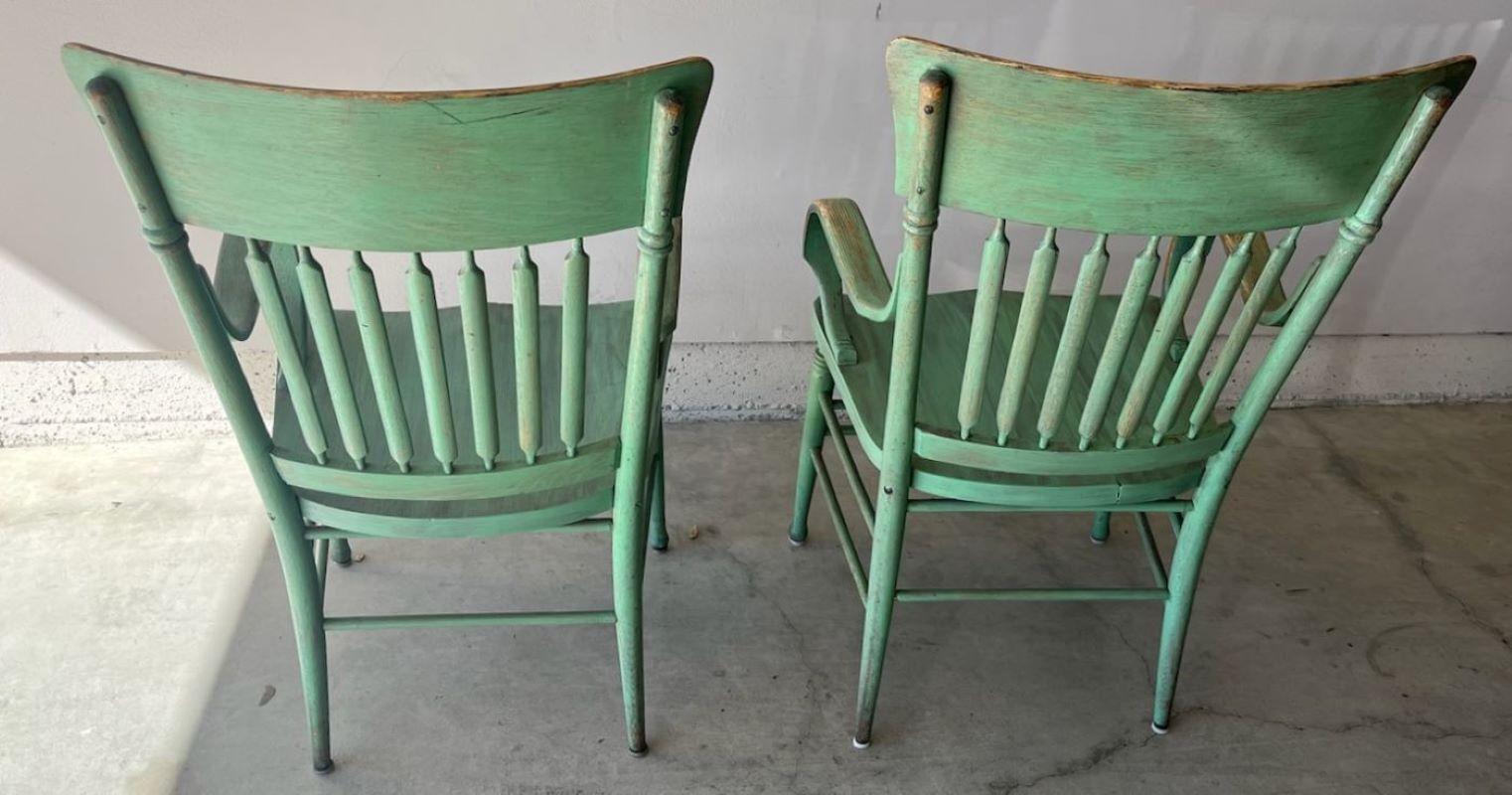 Wood Matching Pair of E. 20thc Original Green Painted Arm Chairs For Sale