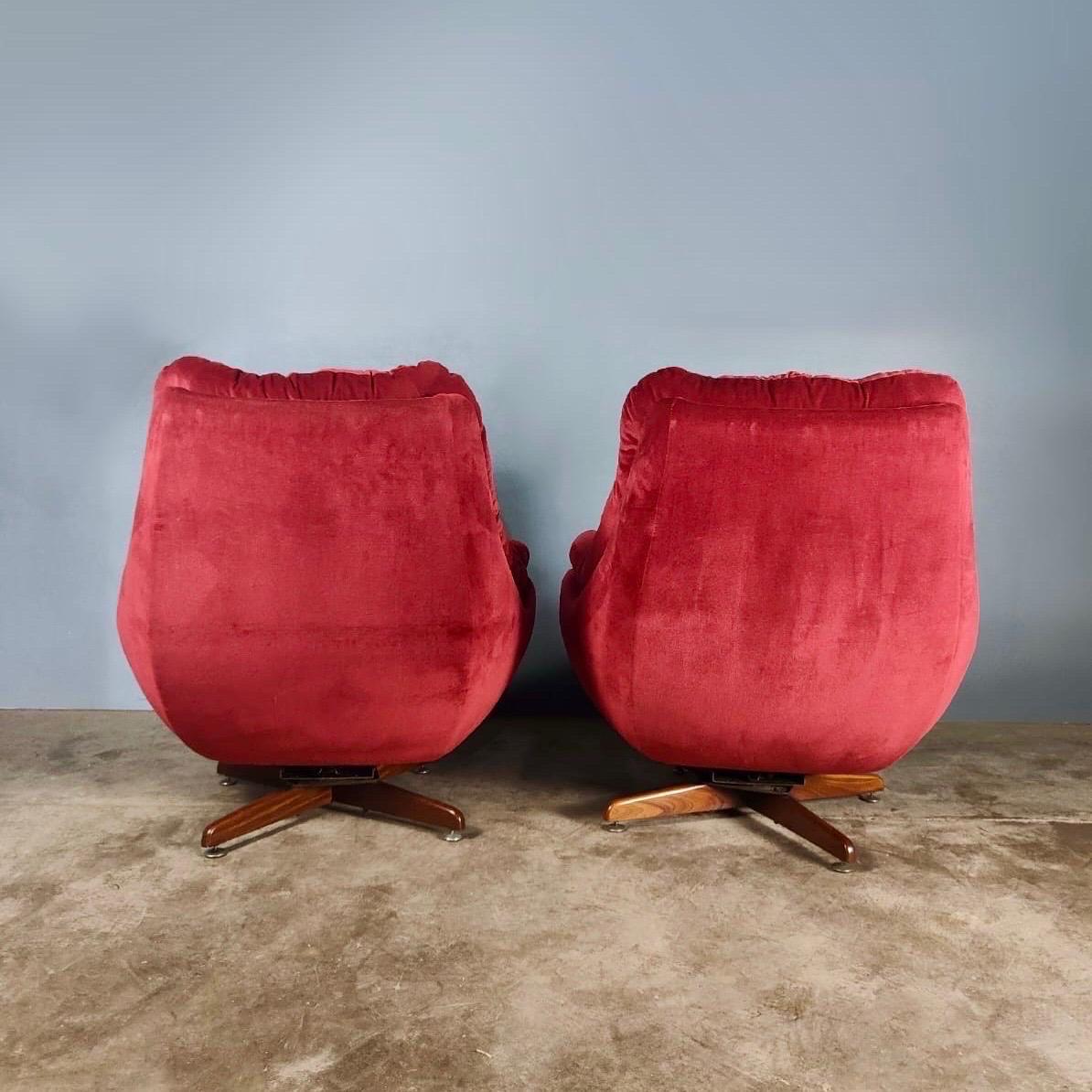 Mid-Century Modern Matching Pair Of Pink Red Swivel Velvet Lounge Egg Chairs Mid Century Vintage For Sale