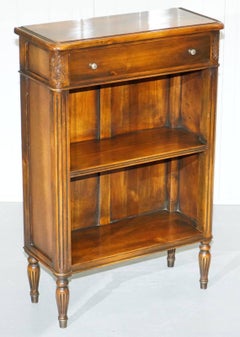 Matching Pair of Theodore Alexander Republic Low Bookcases with Single Drawer