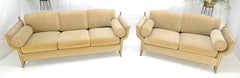 Juego a juego de sofá y sillón doble atribuidos a Versace, decorados con remates