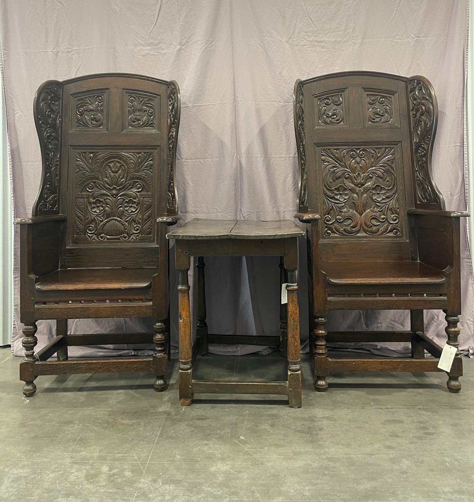 Matching pair of Victorian Carved Oak Wing Arm Chairs For Sale 7