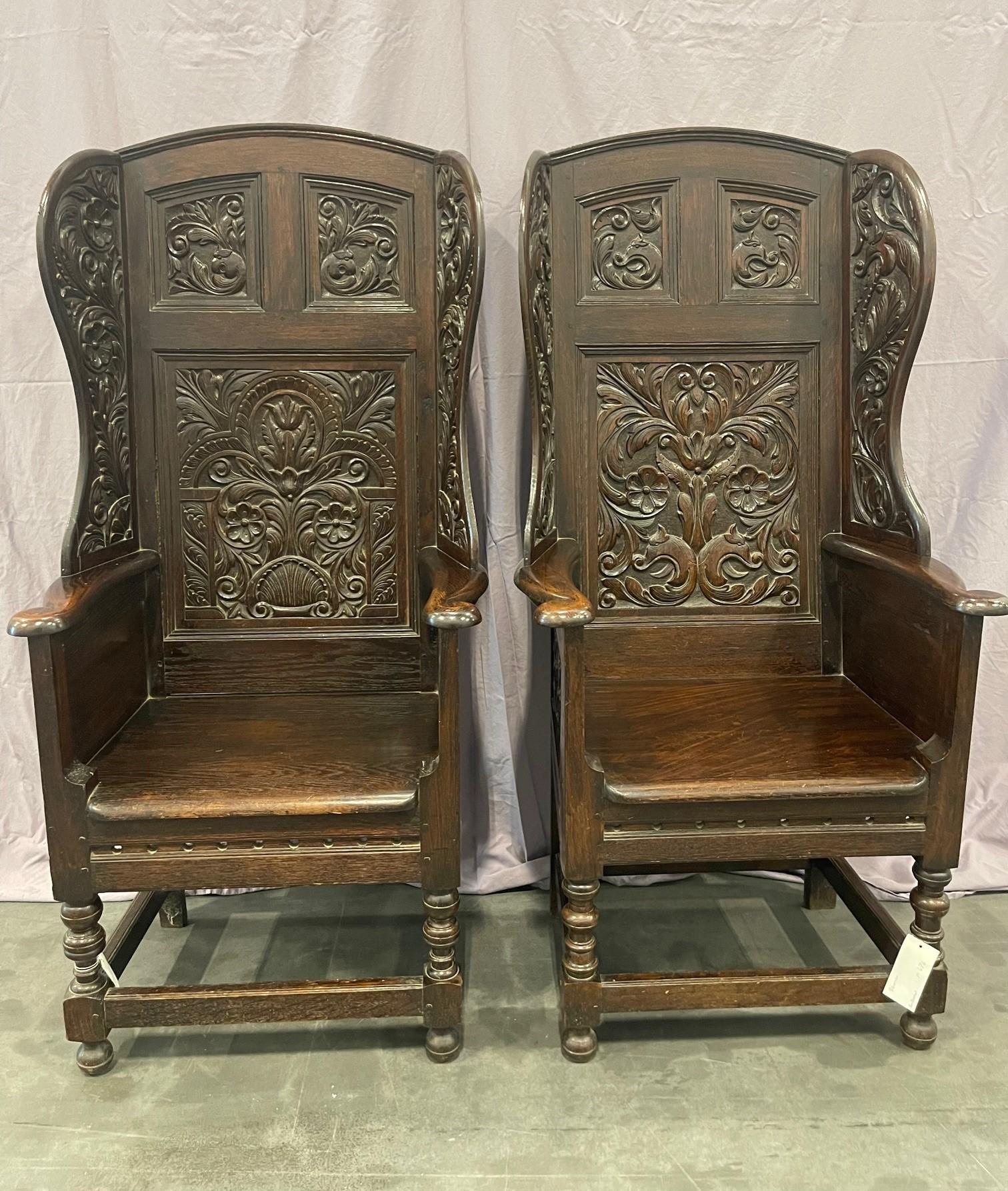 Matching pair of Victorian Carved Oak Wing Arm Chairs For Sale 8