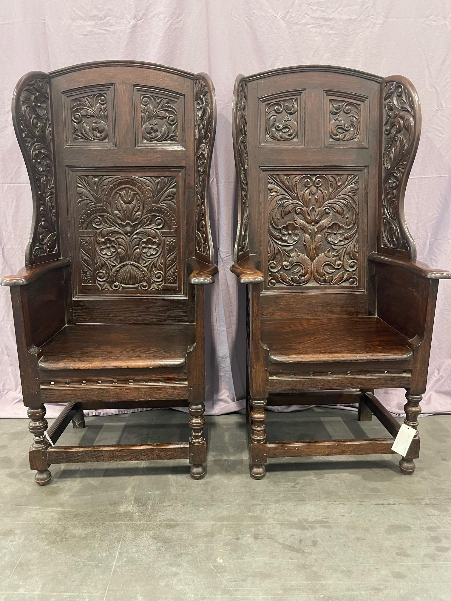 Matching pair of Victorian Carved Oak Wing Arm Chairs For Sale 9