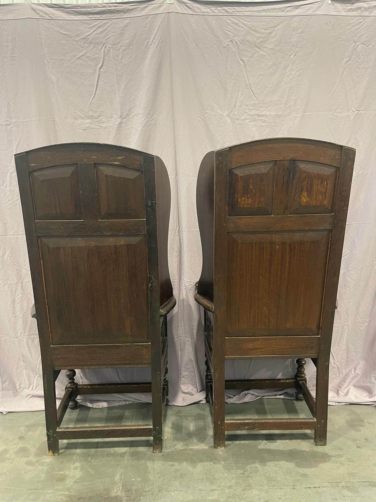 Matching pair of Victorian Carved Oak Wing Arm Chairs For Sale 10