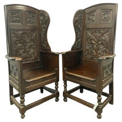 Antique Matching pair of Victorian Carved Oak Wing Arm Chairs