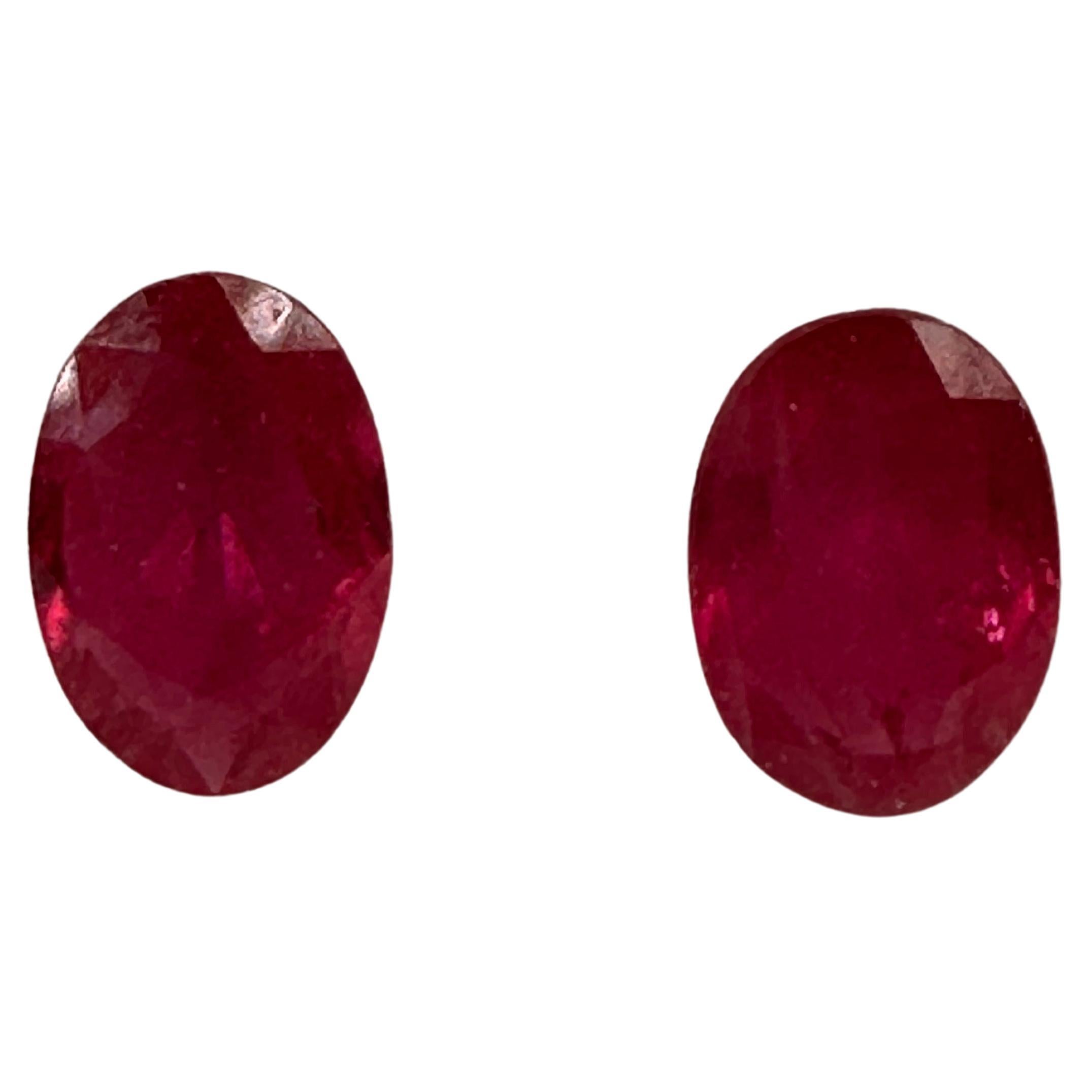 Matching ruby pair untreated 6.5x4.5mm ruby oval natural pinkish red For Sale