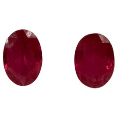 Used Matching ruby pair untreated 6.5x4.5mm ruby oval natural pinkish red