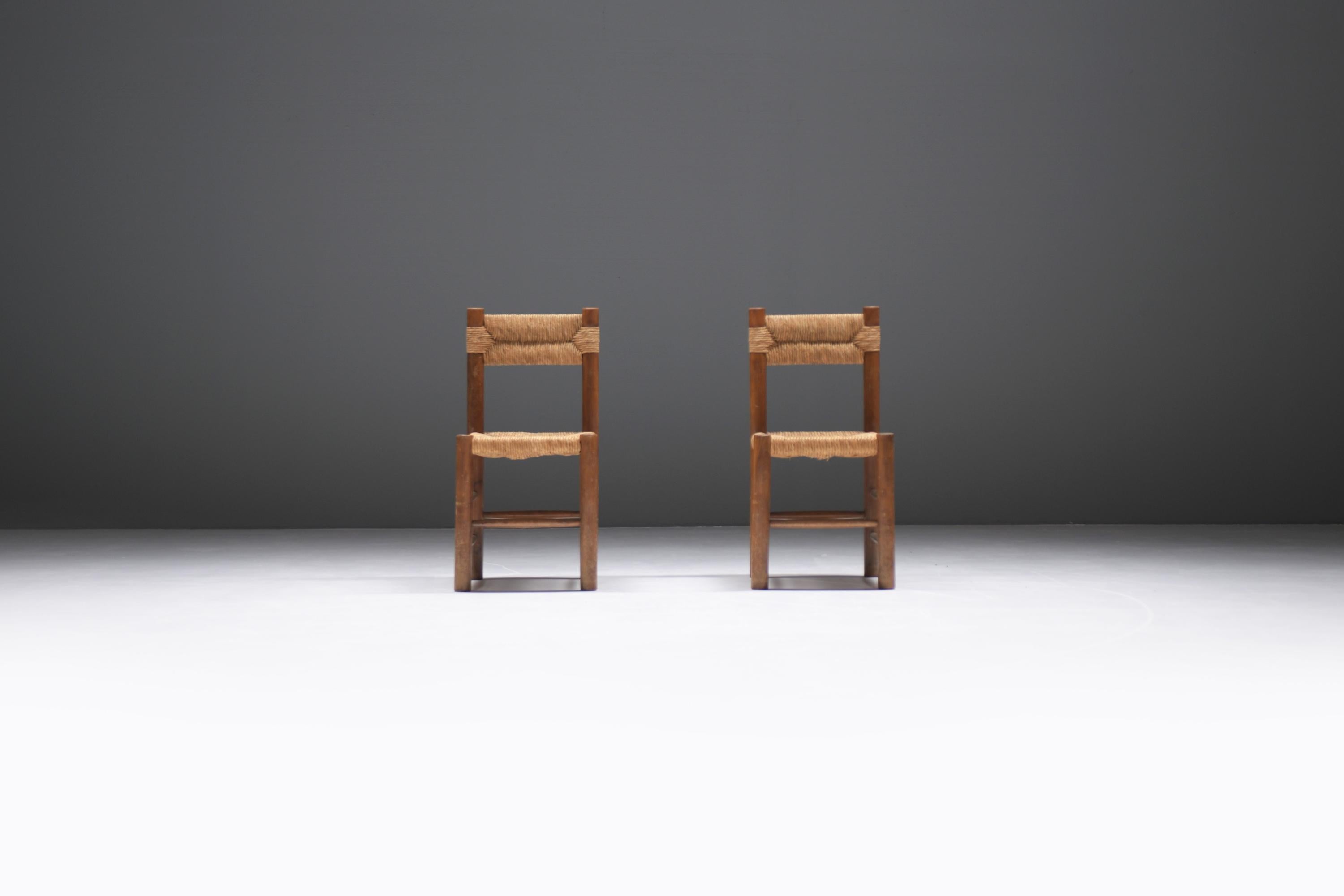A matching set of 2 vintage ‘Dordogne’ dining chairs in a remarkable original condition. Showing a stunning patina and natural wear on the wood and straw, celebrating the passage of time.
Designed & manufactured at the request of Charlotte Perriand