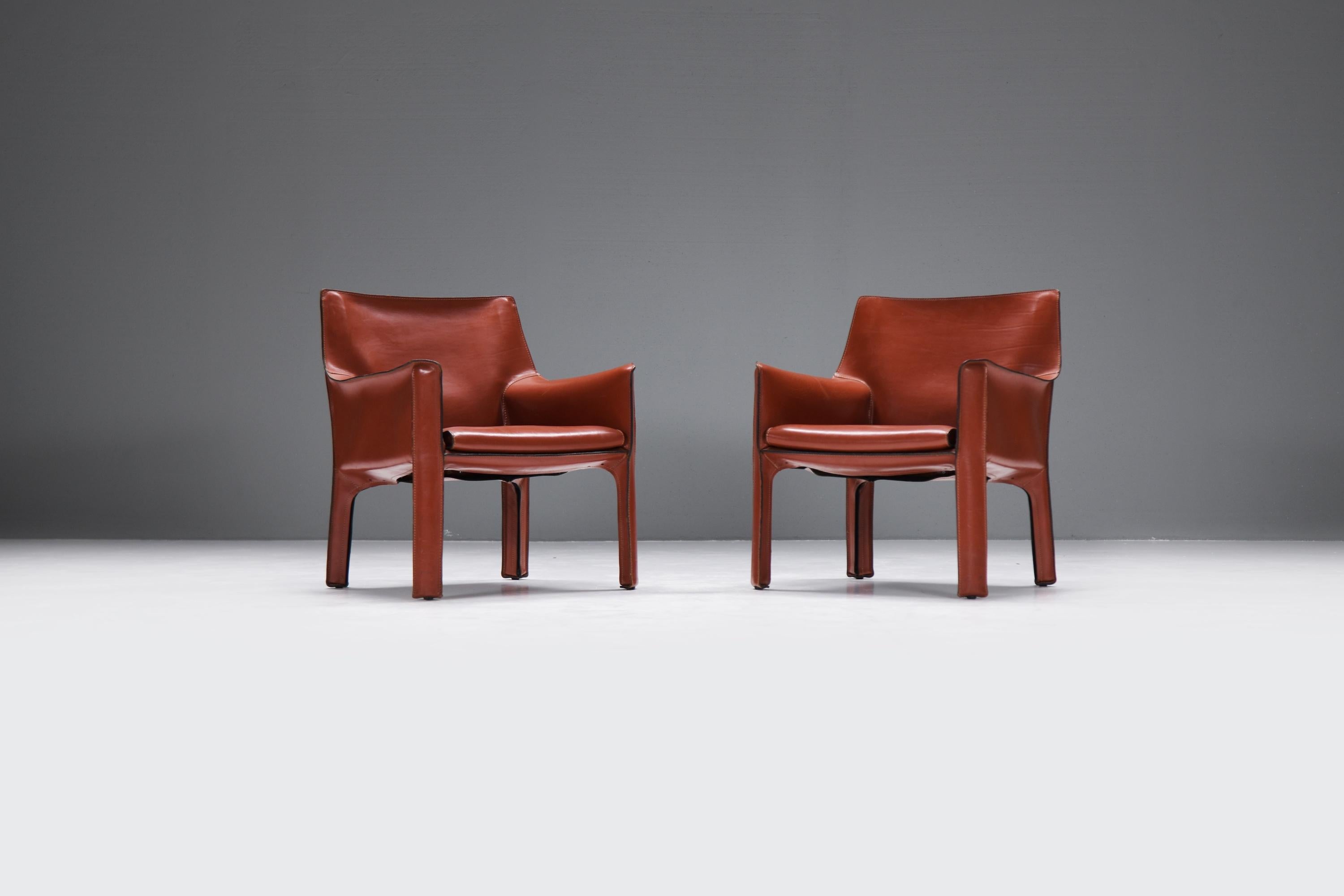 Matching vintage Cab 414 set in burgundy leather by Mario Bellini for Cassina 1