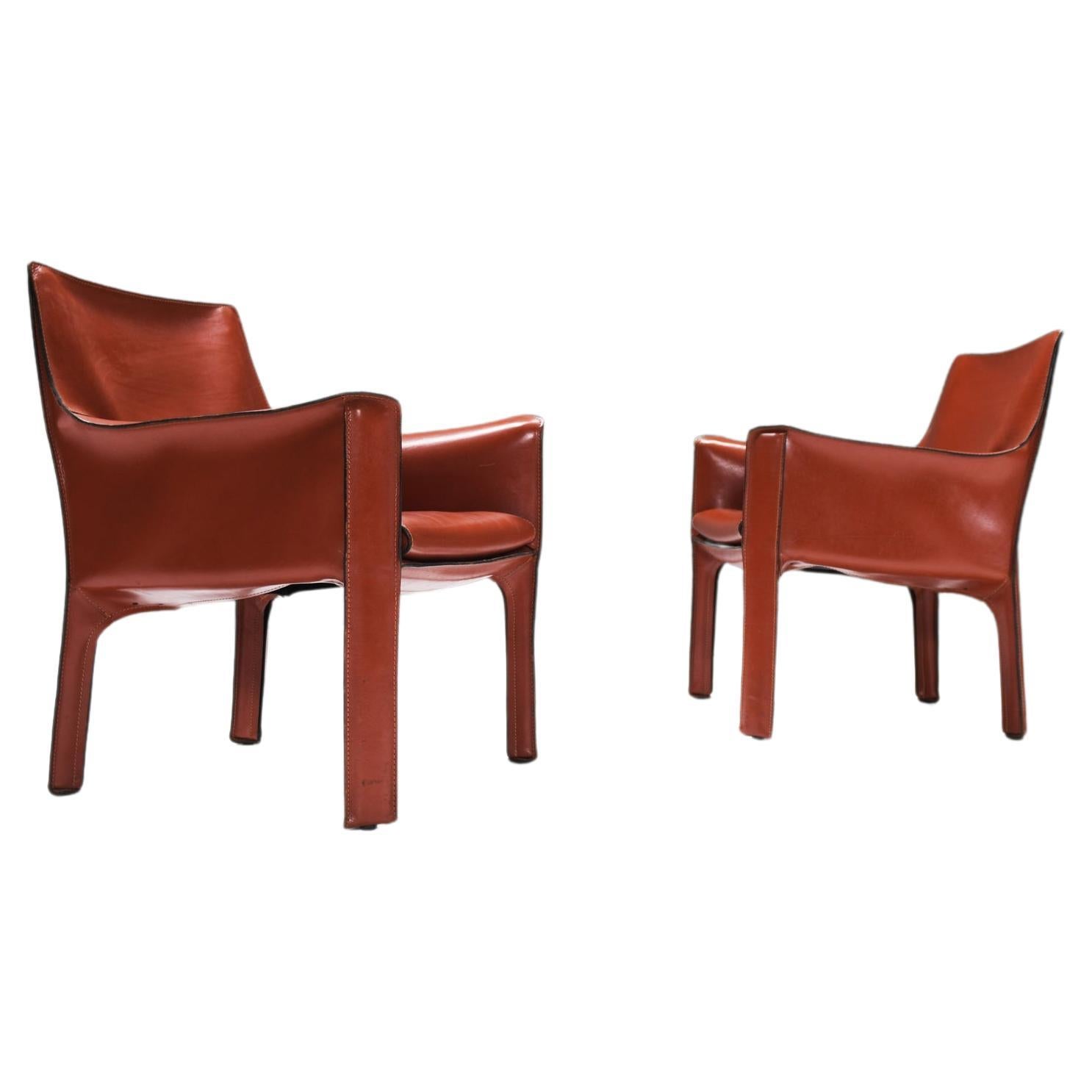 Matching vintage Cab 414 set in burgundy leather by Mario Bellini for Cassina