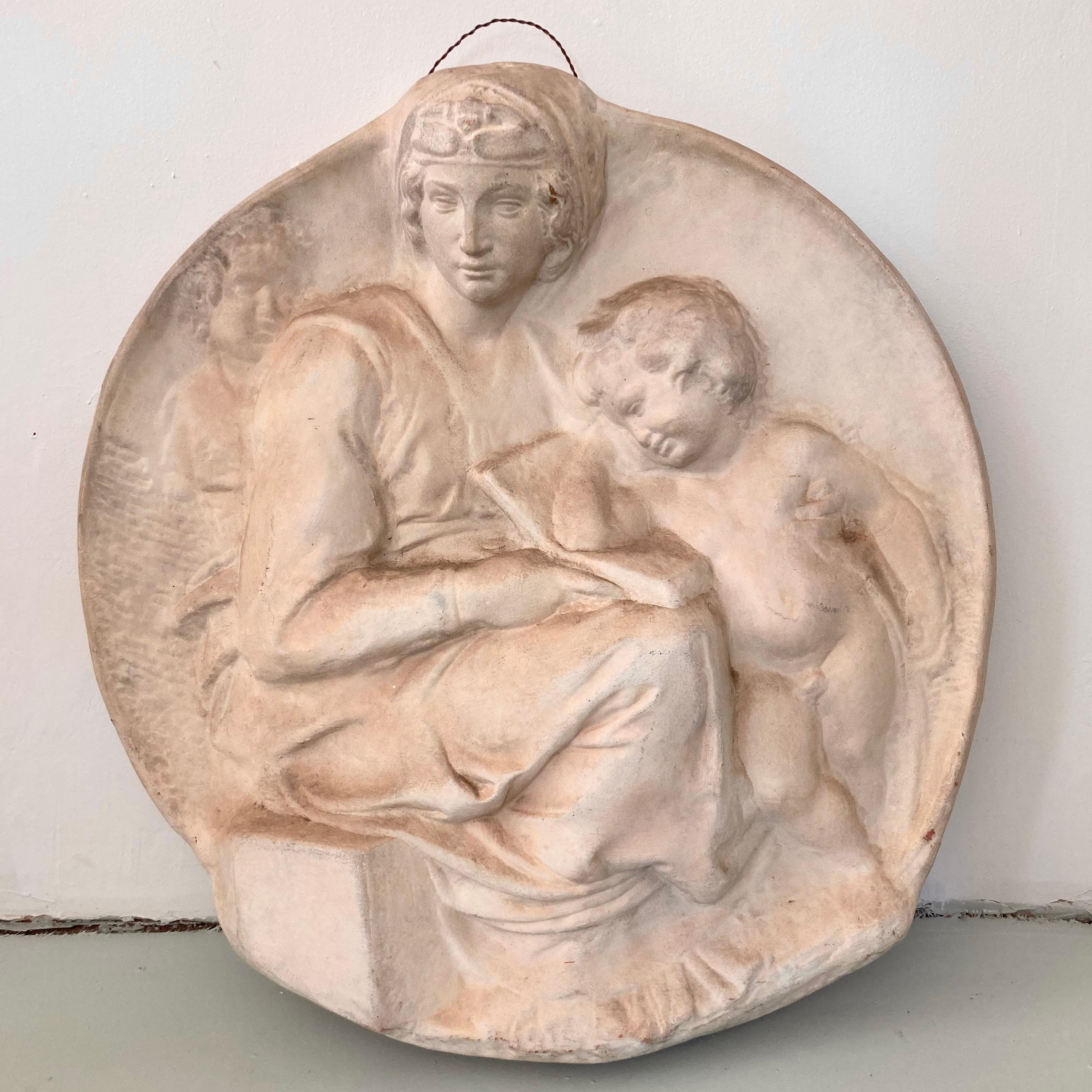 Beautiful mate glazed terra cotta wall hanging. Great carving details of the Madonna and the Child.
