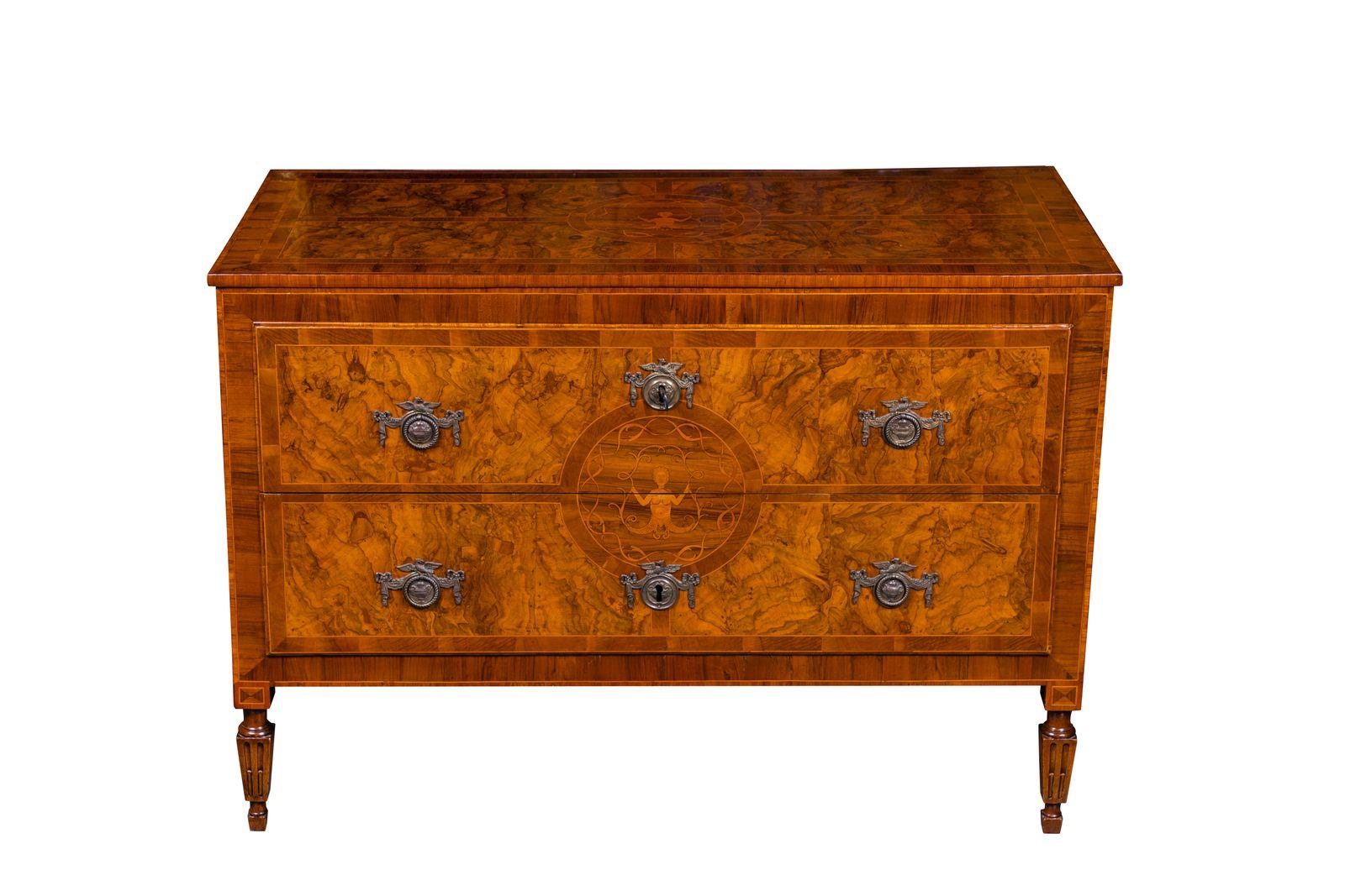 An absolutely glorious pair of c. 1780, hand-carved, two-drawer, veneered and marquetry inlaid commodes from Lombardi, Italy. Each in burl and walnut, and featuring medallions of a mythical creature surrounded by intertwining scrolls.