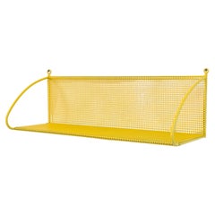 Estantería de pared amarilla perforada estilo Mategot by Pilastro