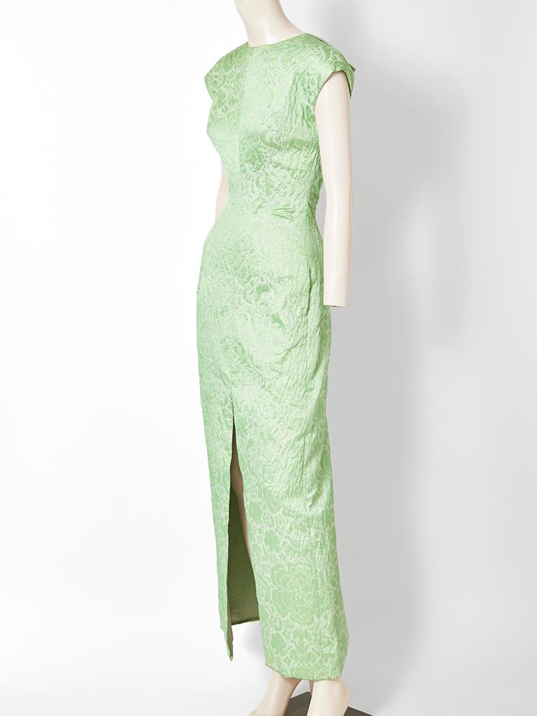 Mint green, jeweled neckline, cap sleeved, fitted sheath gown,  with a deep center front slit. C. 1960's. Attributed to have belonged to Ava Gardner.