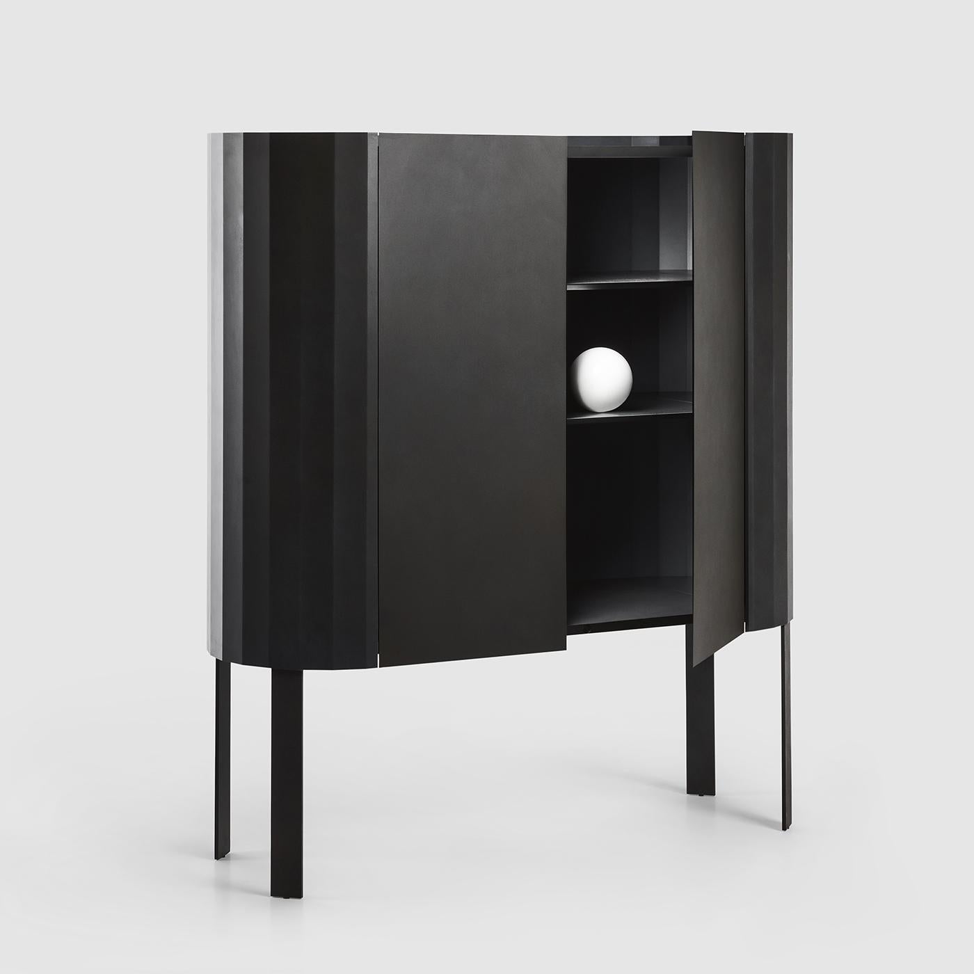 A splendid piece of modern flair, this sideboard boasts a total black look that will infuse any room with subtle sophistication. Crafted of steel, it features two doors and two inner shelves enriched with an MDF core. Externally, the piece is marked