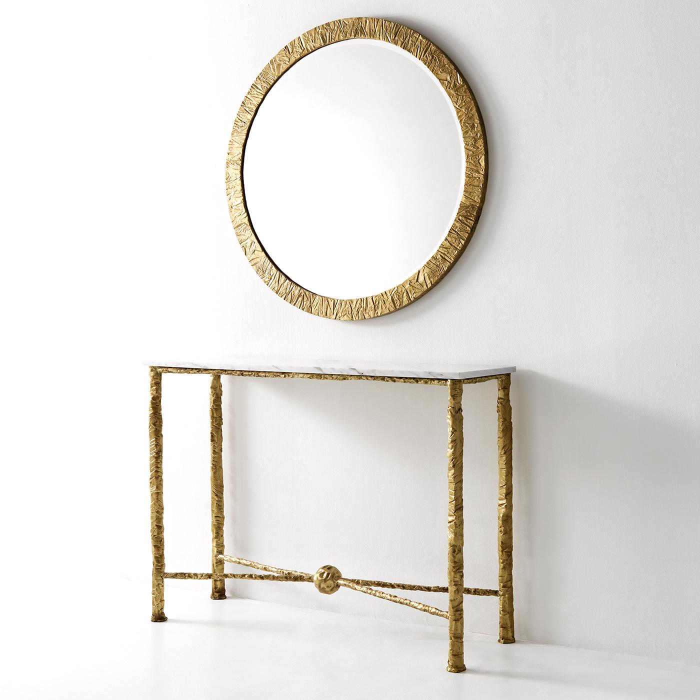 The Materia console table is a lavish piece with a white Calacatta marble top and a sturdy brass structure. Its finish is in natural brass with lacquer. This console table is an exquisite, chic, and fancy item and it is amazing to observe the
