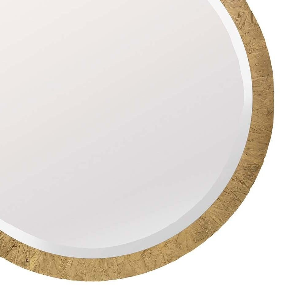 This superb mirror is a striking example of subtle sophistication. Its round silhouette is timeless and refined, highlighted with a thin frame in brass with a natural finish. An elegant reflective surface in a powder room, entryway, or bedroom, this