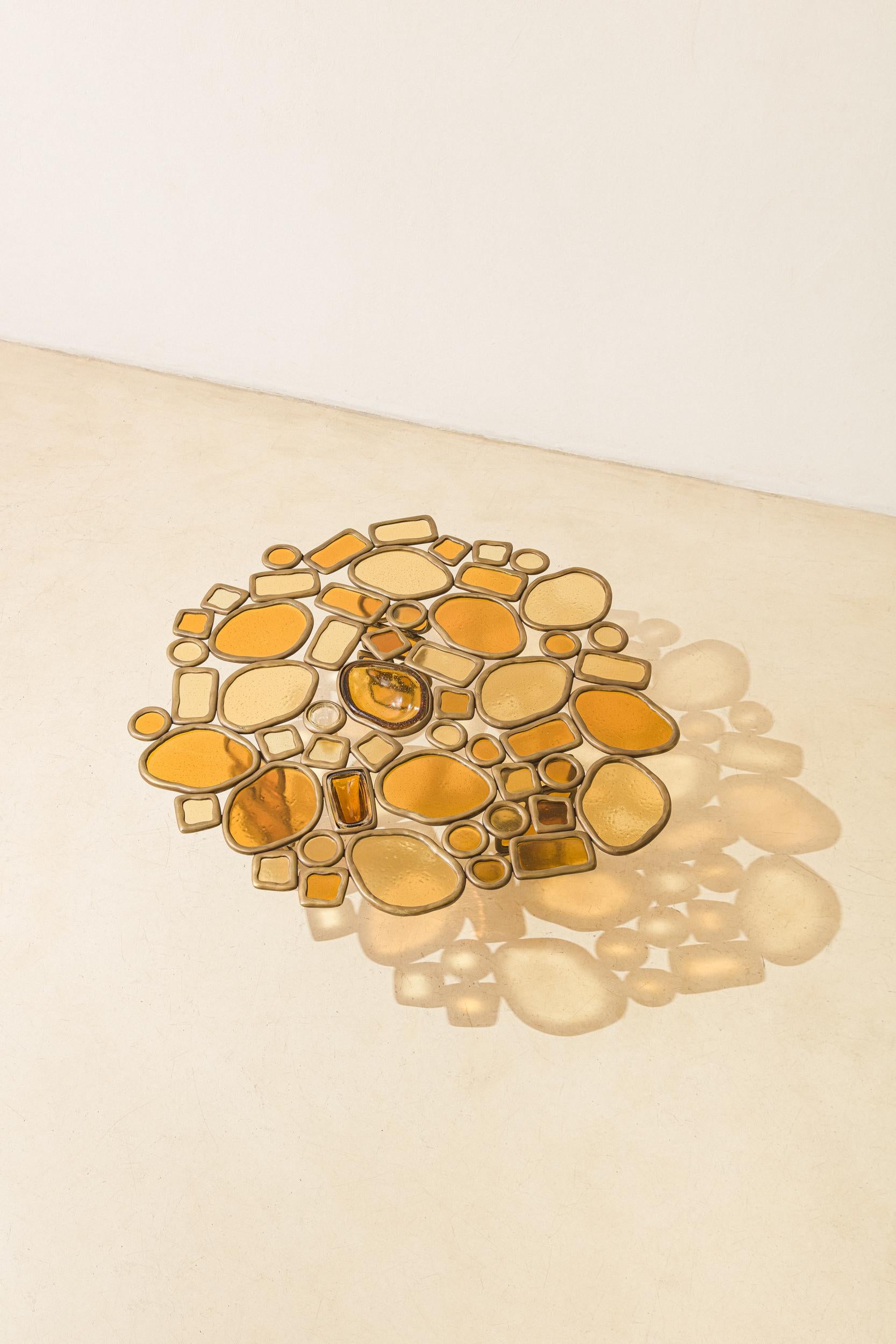 In the Material Distortion collection, Recchia combines elements in assemblages to create various pieces. Using just four ring shapes—two rounded and two rectangular—in either bronze or aluminum, different arrangements and growth directions give