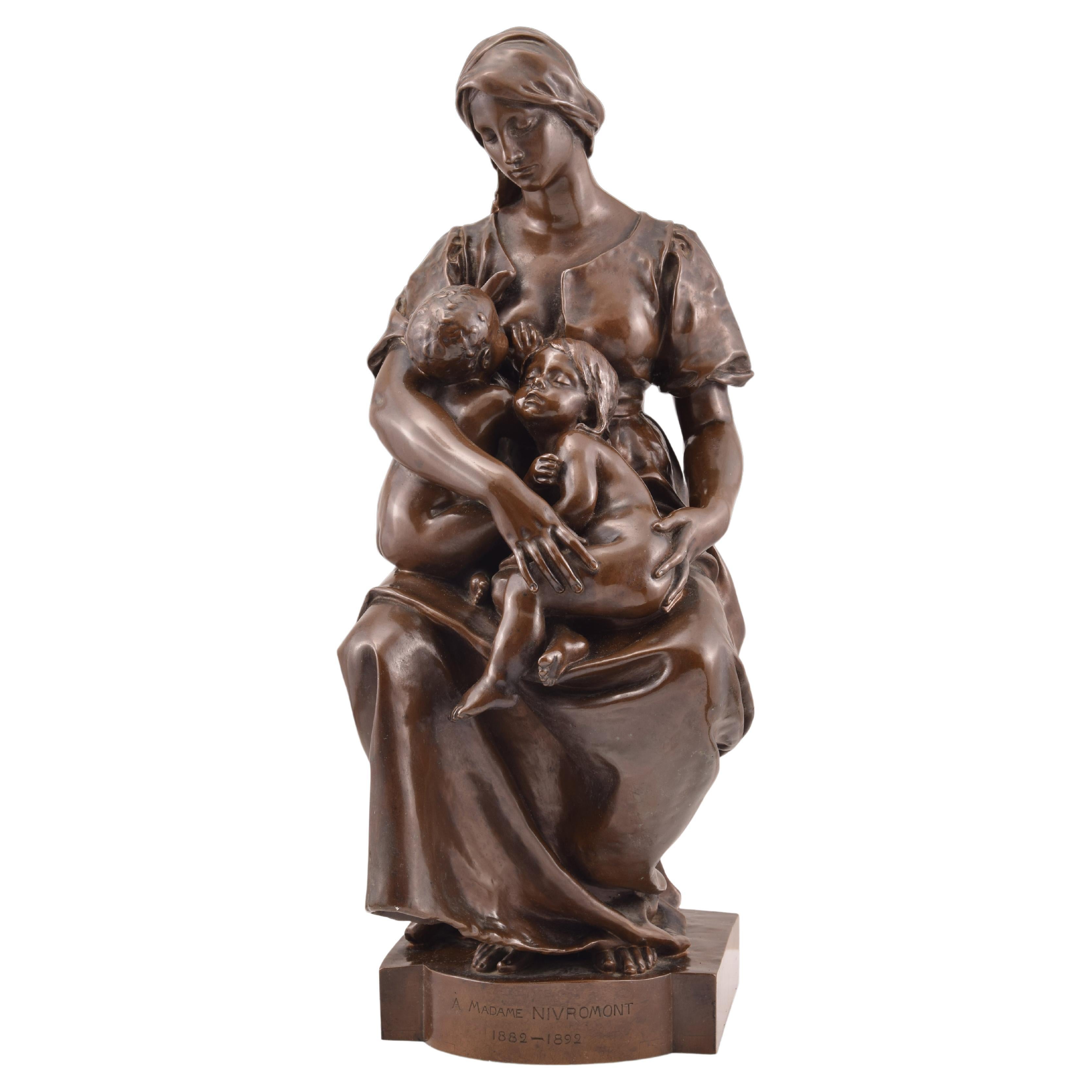 Maternity. Bronze. France, circa late 19th century, DUBOIS, Paul.