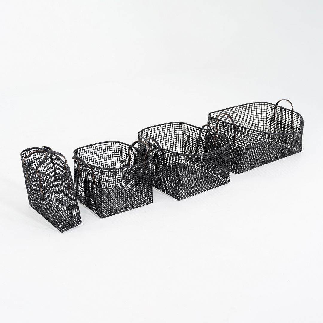 This is a Matheson Large Laundry Basket, designed and produced by Zach Matheson in Washington State, USA in 2024. The design is comprised of recycled post-industrial mesh and Washington and Oregon leather hide. While this piece is intended to be