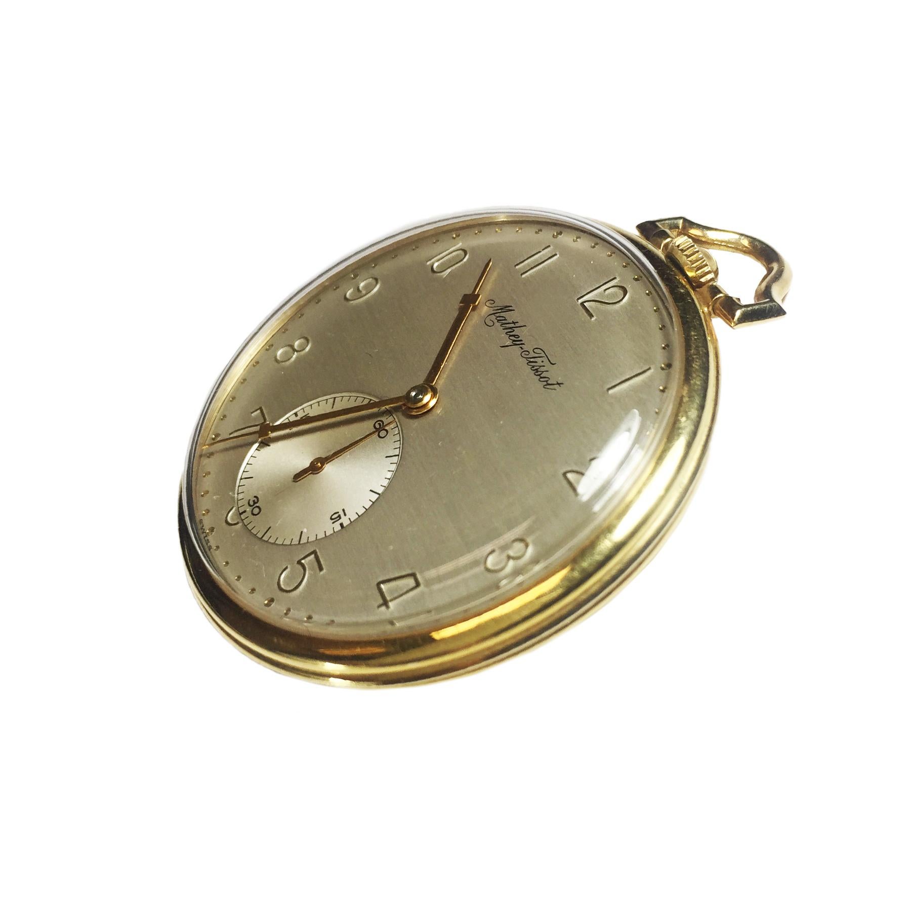 From the Estate of Comedian Jerry Lewis is this Mathey Tissot Pocket Watch, 42 MM 14K yellow Gold 3 piece case, 17 Jewel manual wind, Nickel lever movement,  silvered dial with raised Gold Markers and a sub seconds chapter.  The Case back is