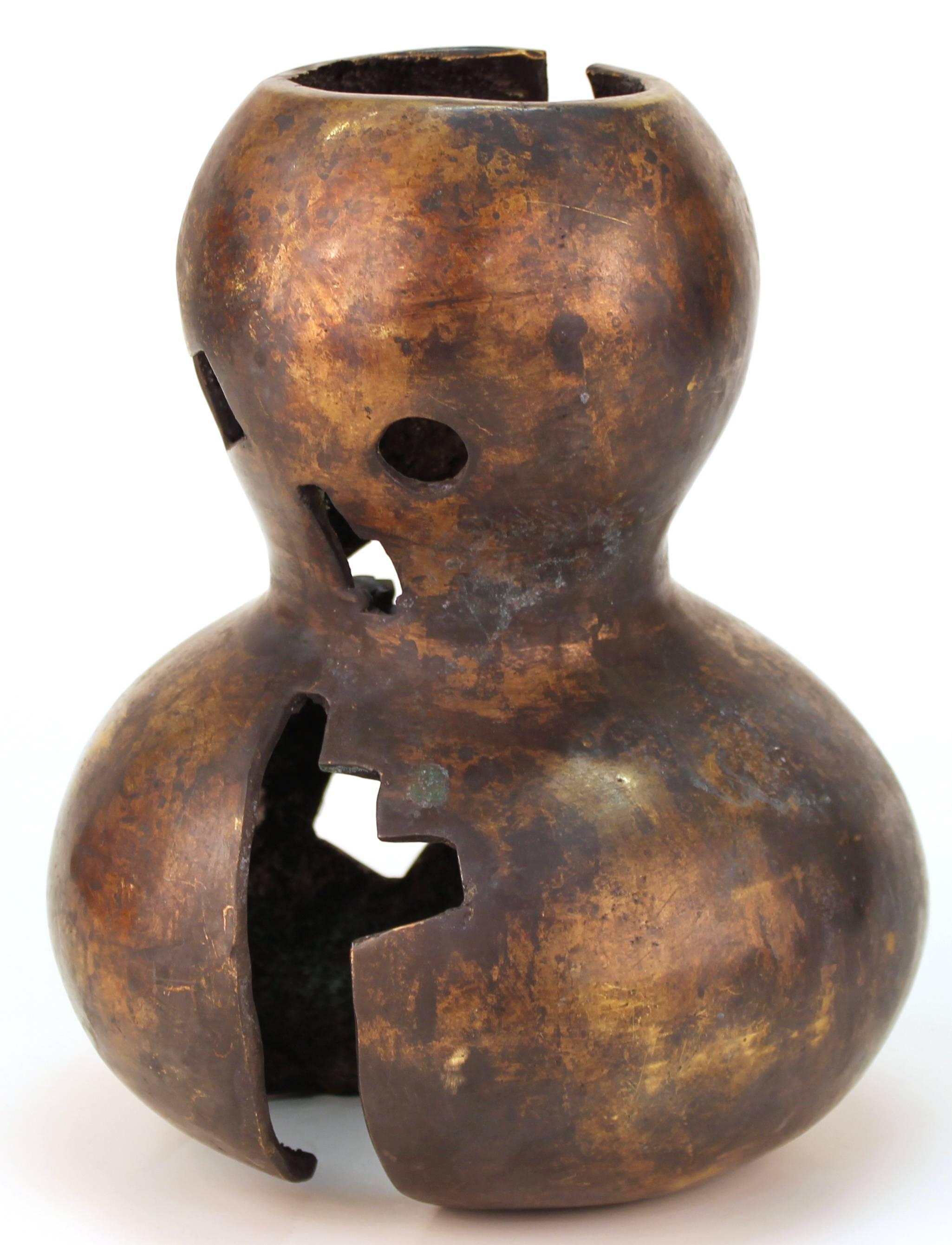A bronze sculpture of an abstract head shaped figure, made by German-born Mexican artist Mathias Goeritz (1915-1990) in the 1950s-1960s. The piece is initialled [MG.] on the lower bottom half. Some scratches to surface but overall in great vintage