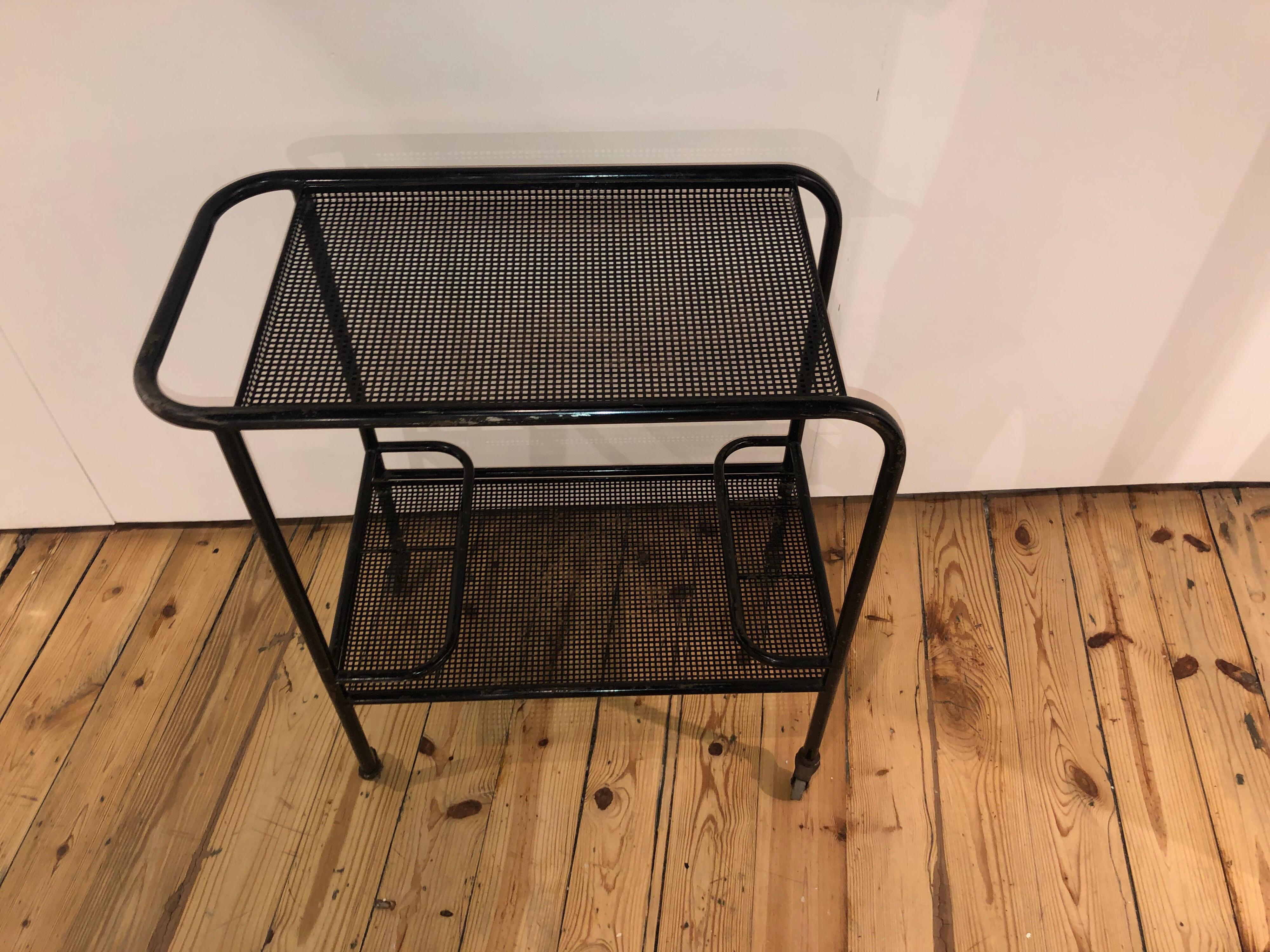 Mathieu Mategot barcart in enameled black steel with square cut trays. All original finish.
   
