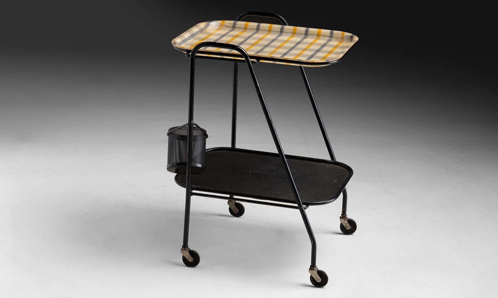 France, 1956
Metal mesh cart with cupholder and plaid resin tray top.
16”w x 18.25”d x 25.25”h
Ref. MOD1096
$ 5,200