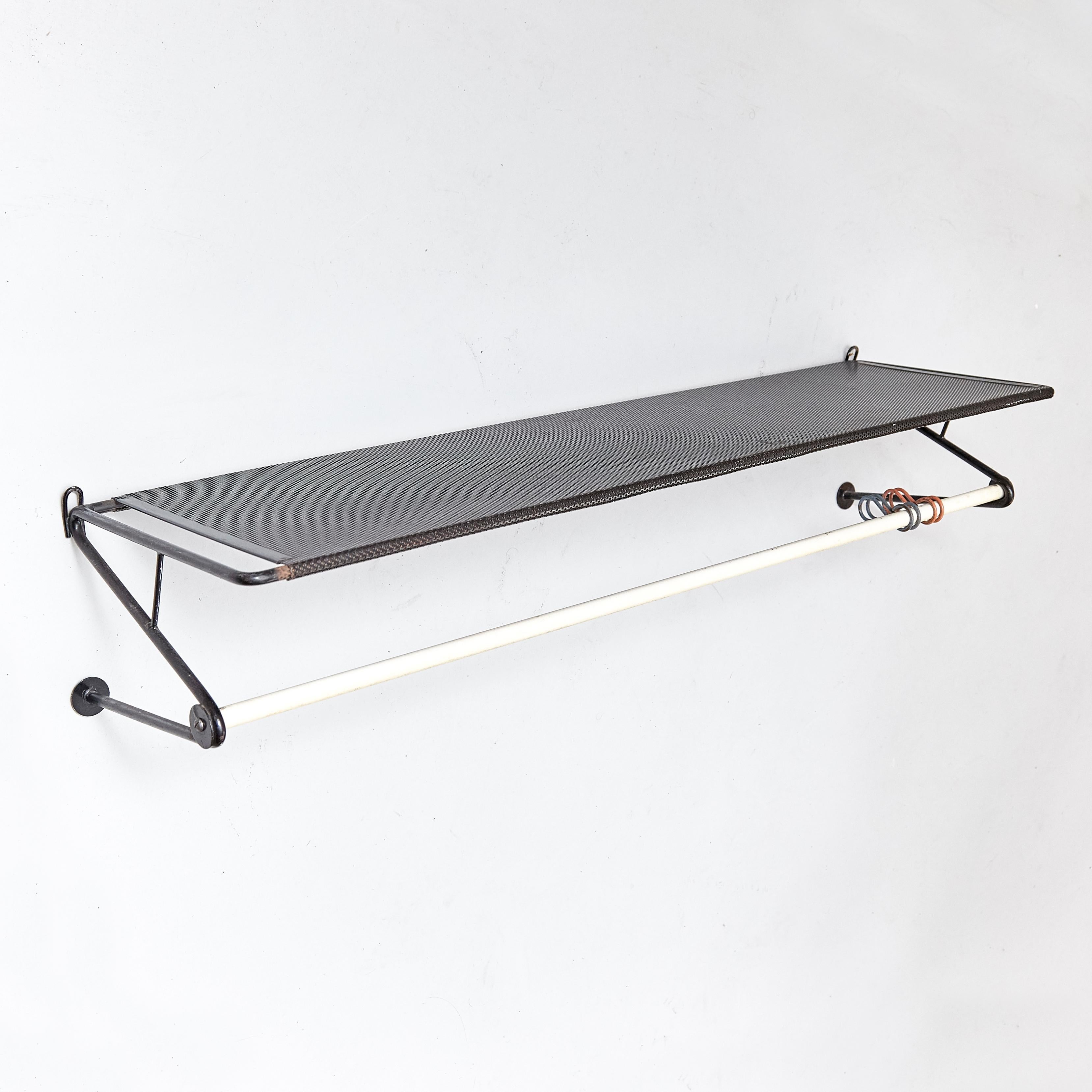 Coat rack designed by Mathieu Matégot.

Manufactured by Artimeta (Netherland), circa 1950.
Perforated, lacquered metal.

In good original condition, with minor wear consistent with age and use, preserving a beautiful patina.

Mathieu Matégot