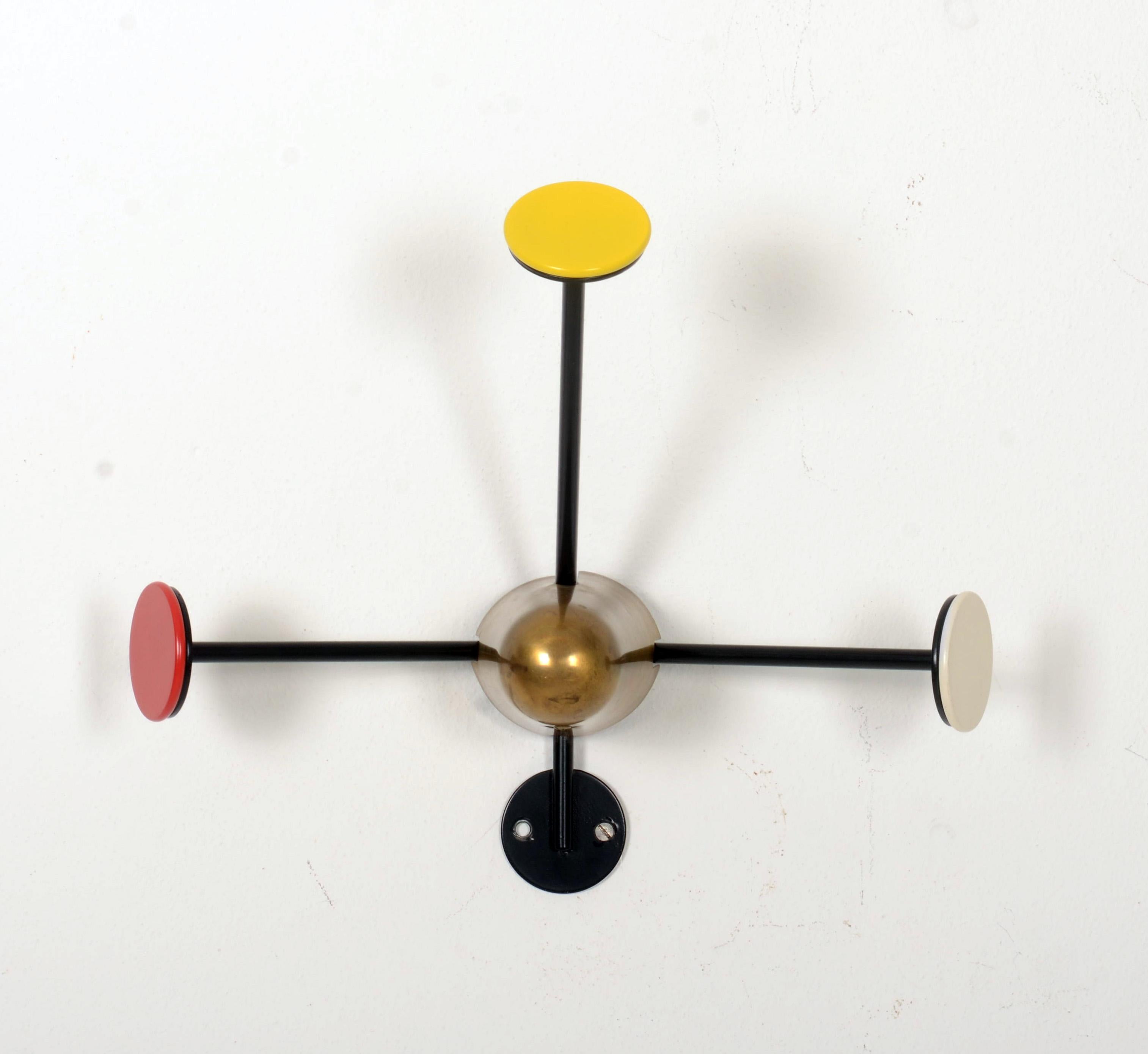 Mathieu Matégot for Gubi. 'Matégot' coat rack - Ocher. Brass, powder coated metal. Shows normal signs of use.
 