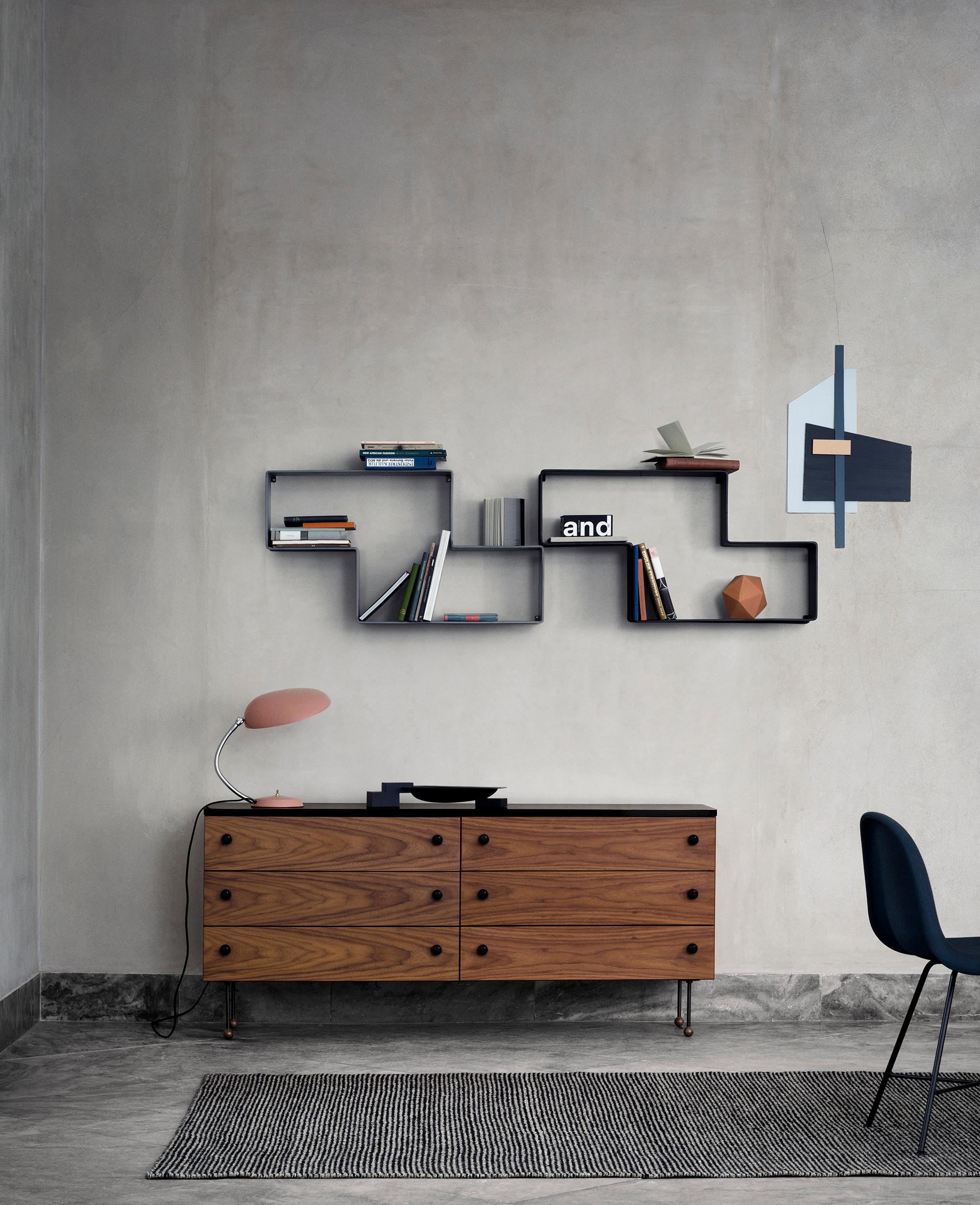 Mathieu Matégot 'Dédal' shelf for GUBI in Black.

Originally designed by Mathieu Matégot in 1955, the Dédal shelf is an authorized re-edition by GUBI. Executed using Matégot's Rigitulle method of connected steel tubes and perforated metal sheets.