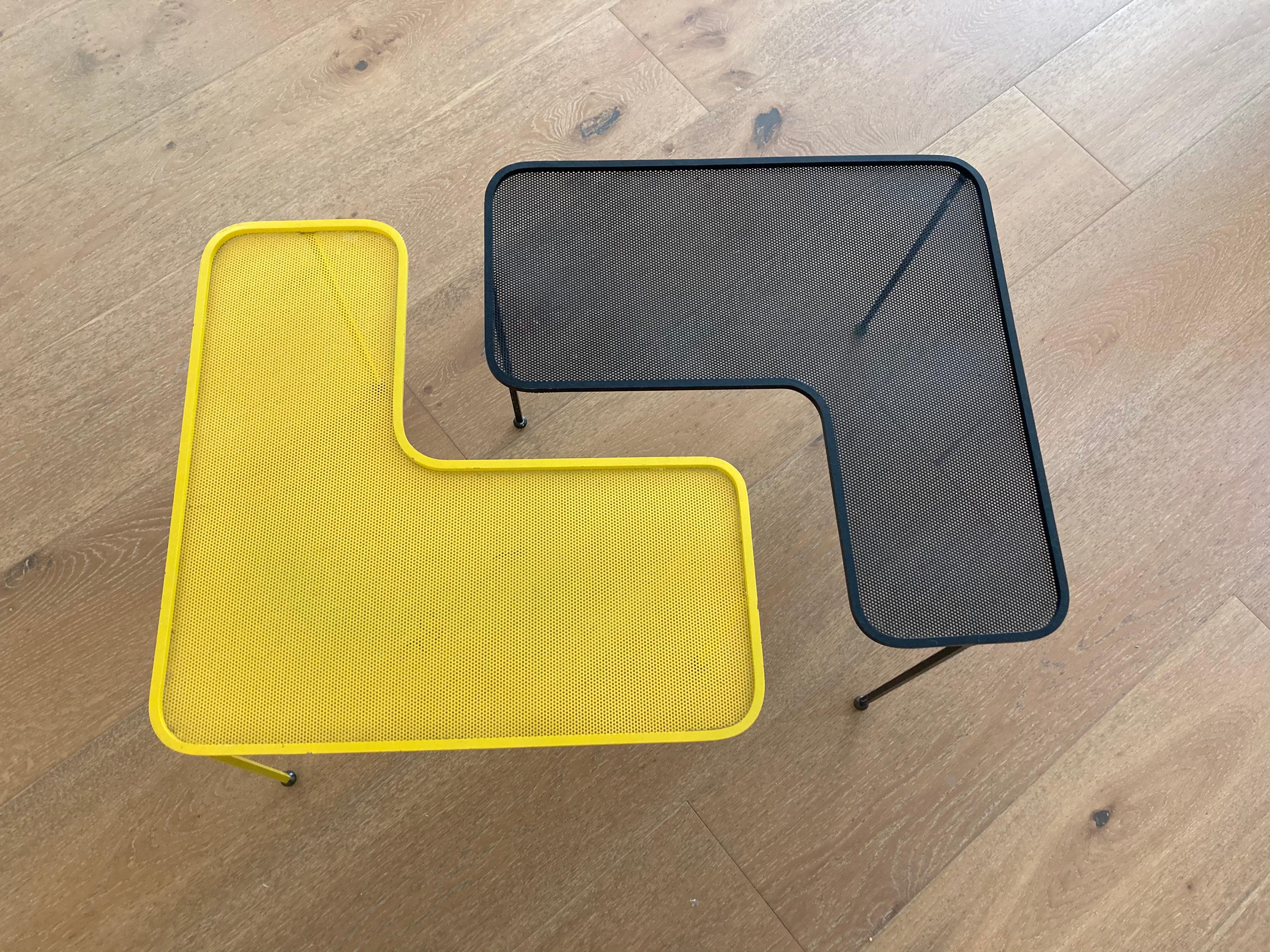Pair of Domino coffee tables by Mathieu Matégot. Black and yellow, lacquered perforated metal and brass.