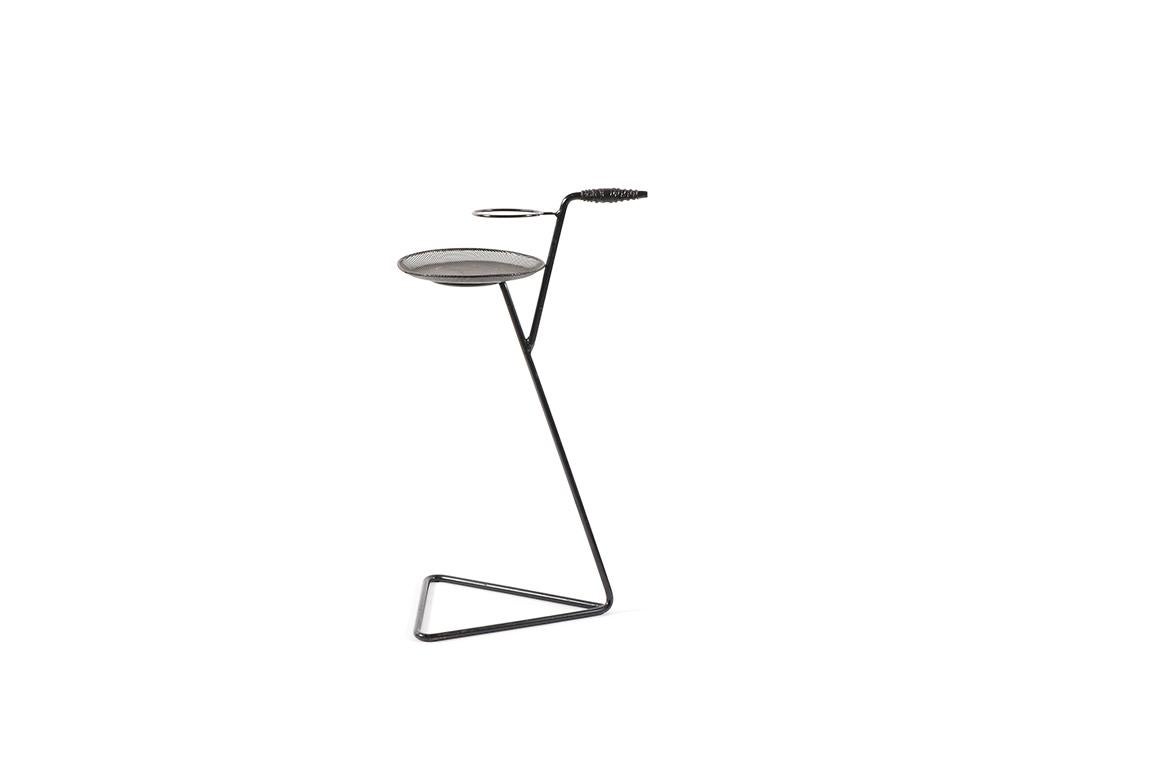 Nice original Mathieu Matégot flying table.
Black lacquered metal.

Very good original condition from the 1950s.