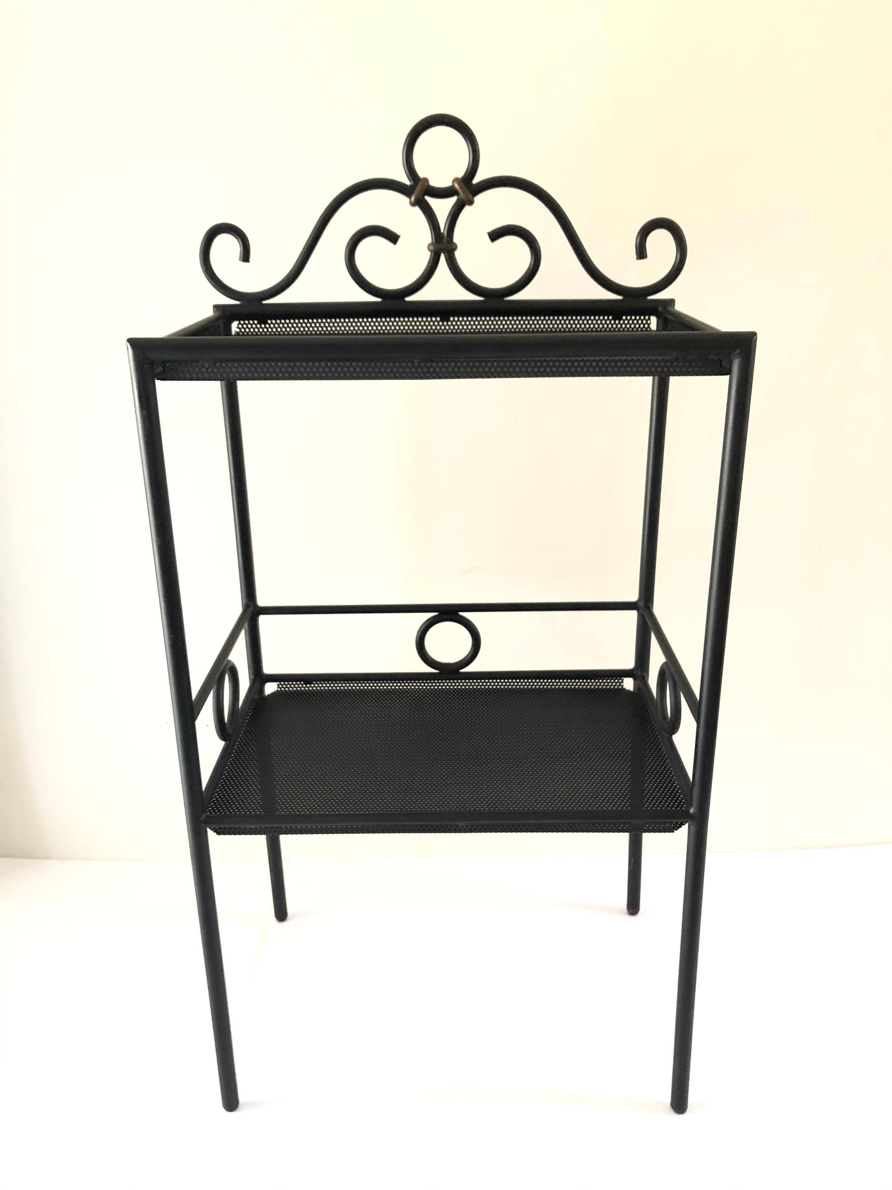 Mathieu Matégot black iron and bronze mesh two tier stand / shelf display
Piece. Hungarian born 1910 -2001, then turned nationality French designer circa 1950s, pioneered perforated sheet metal, collection Musee des Arts decoratifs, Paris.