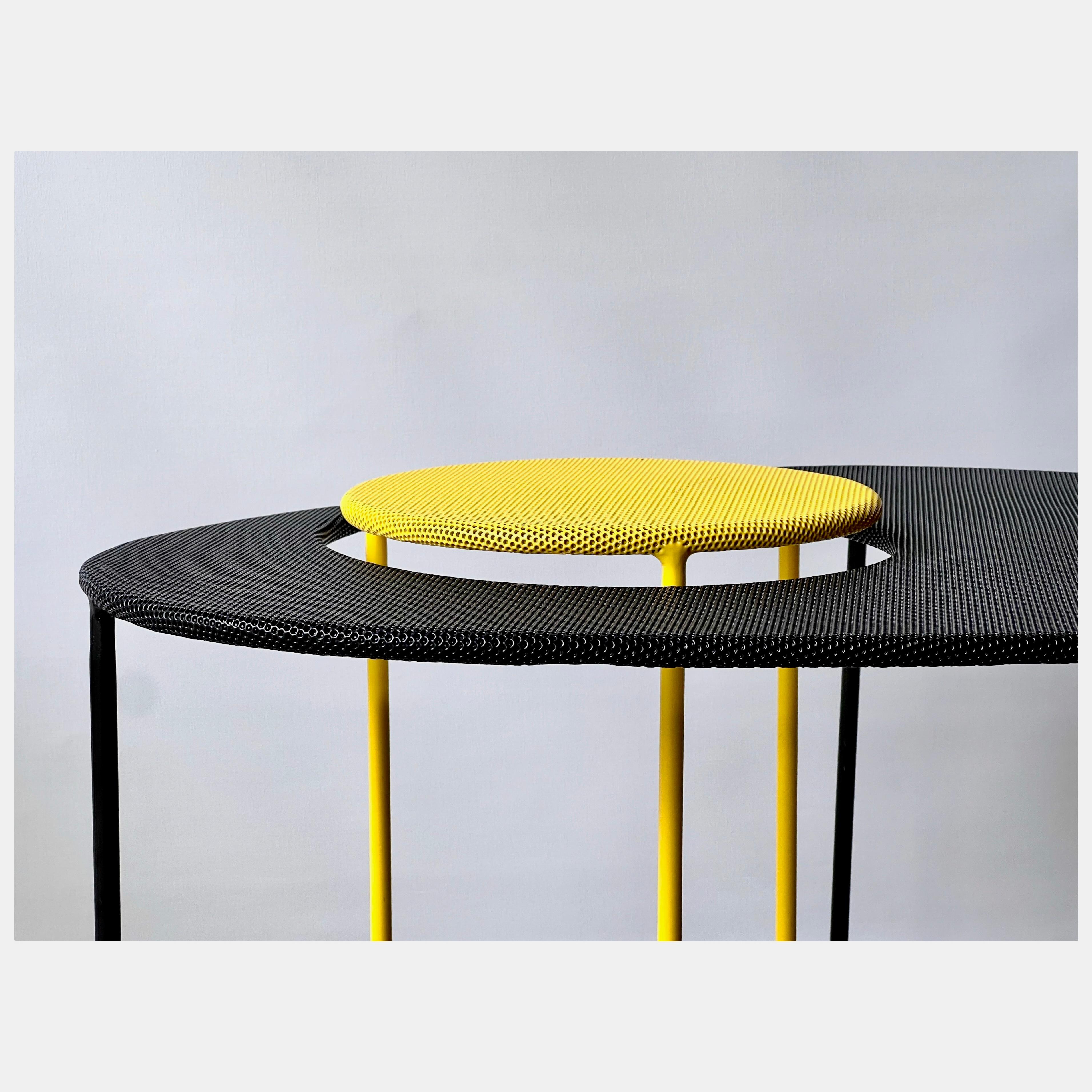 Nesting tables, model Kangourou, designed by Mathieu Matégot.
The design dates to 1954. It is made from powder coated performed aluminium, a technique that Matégot invented a few years earlier and named it Rigitulle and became his trademark.
Reissue