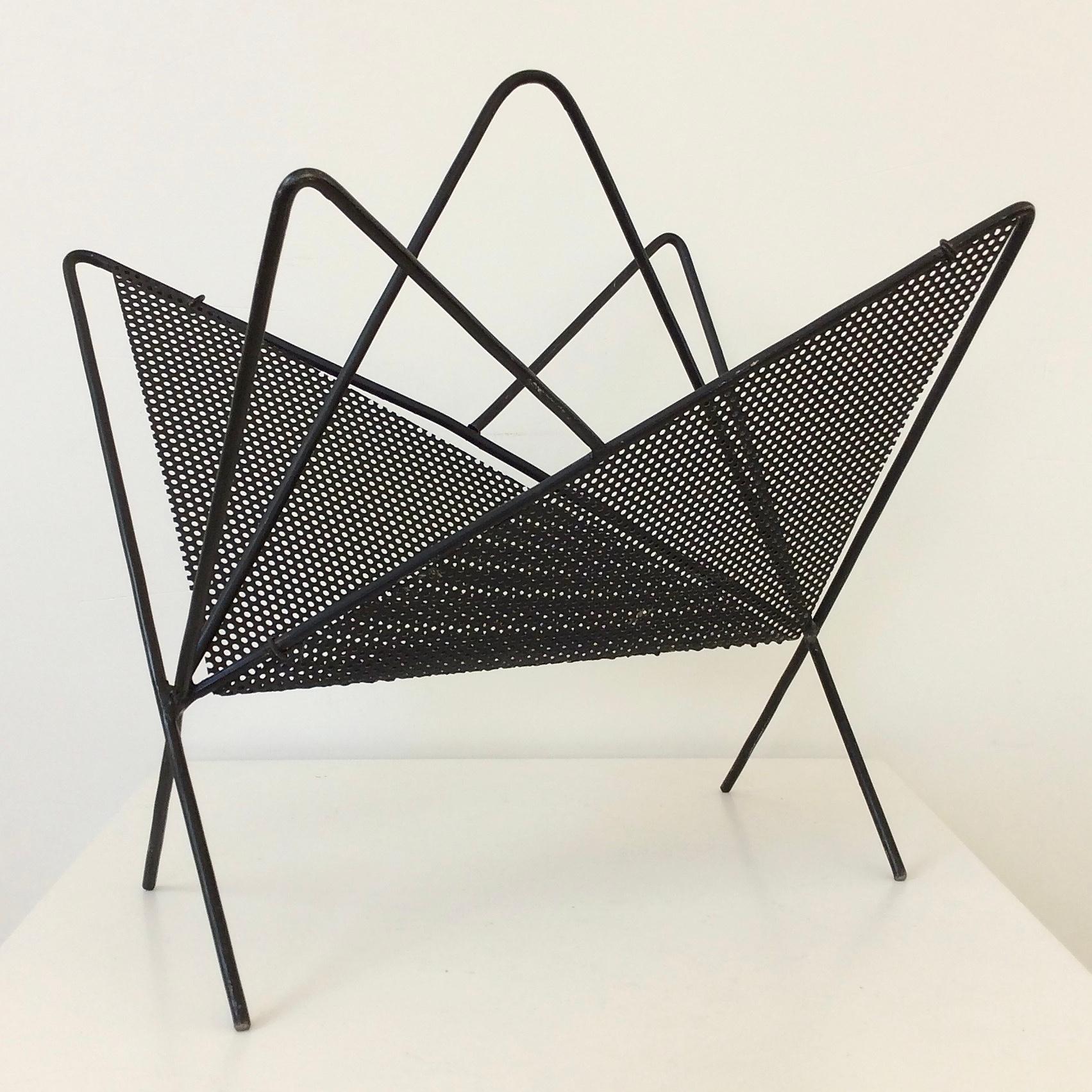 Mathieu Mategot magazine holder, Butterfly model, circa 1950, France.
Manufactured by Les Ateliers Matégot.
Black lacquered folded and perforated metal.
Dimensions: 36 cm W, 38 cm H, 30 cm D.`
Original condition.
All purchases are covered by