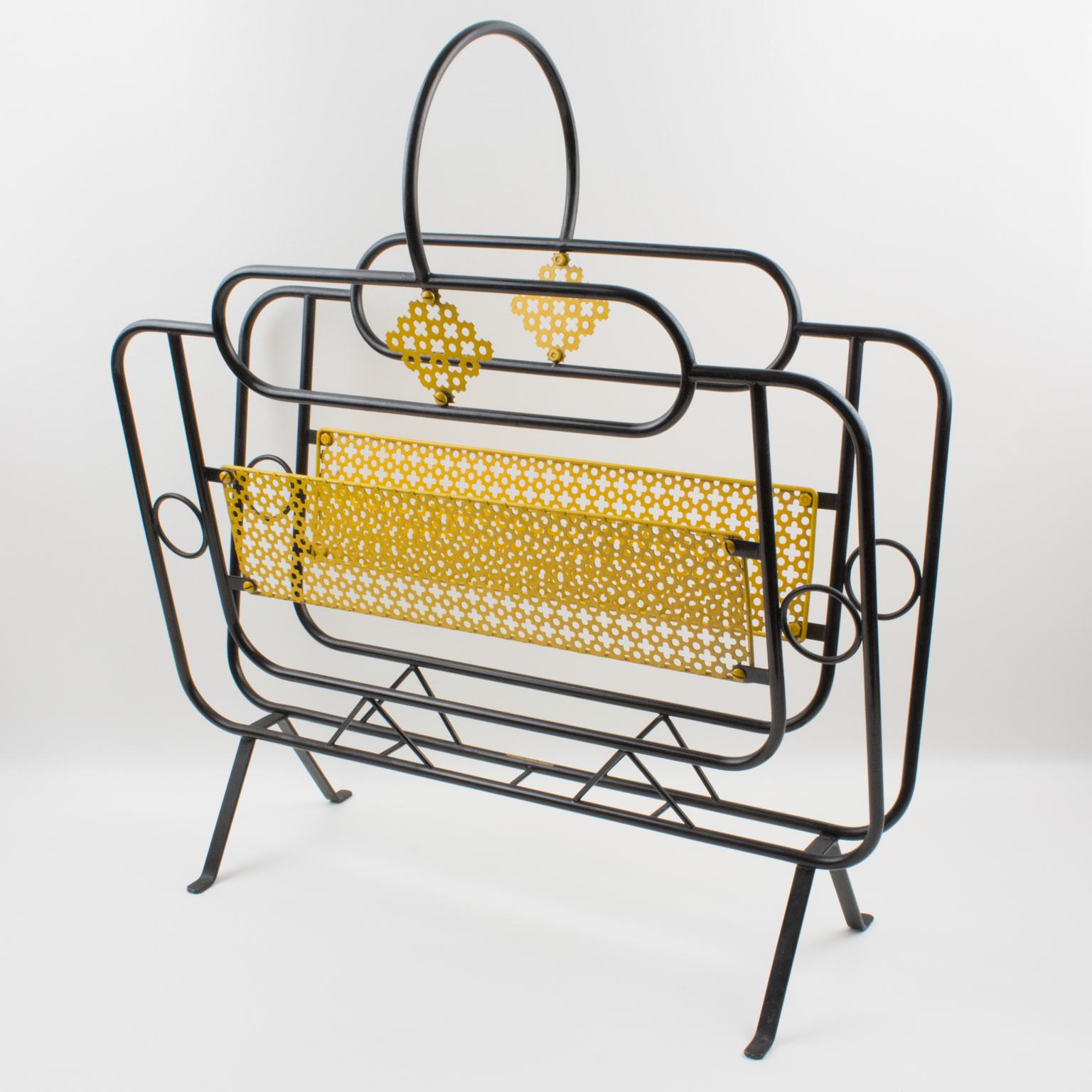 This stunning Mid-Century modernist magazine holder or rack is commonly attributed to Mathieu Matégot (1910-2001). This magazine holder is a striking example of the French 1950s metalwork design. The metal is folded, perforated, and