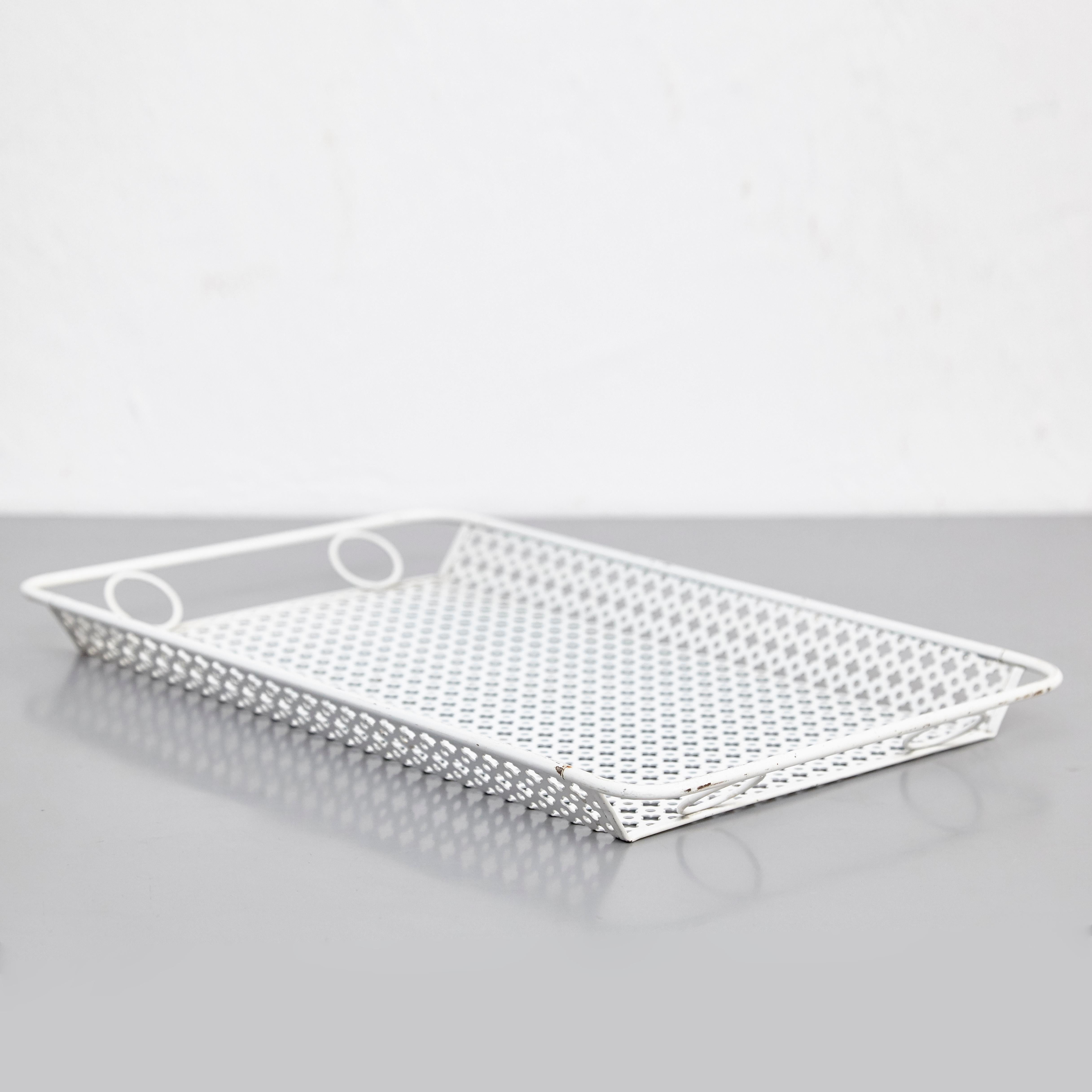 Enameled metal Tray designed by Mathieu Mate´got.
Manufactured by Ateliers Mate´got (France), circa 1950.
Lacquered perforated metal with original paint.

In good original condition, with minor wear consistent with age and use, preserving a