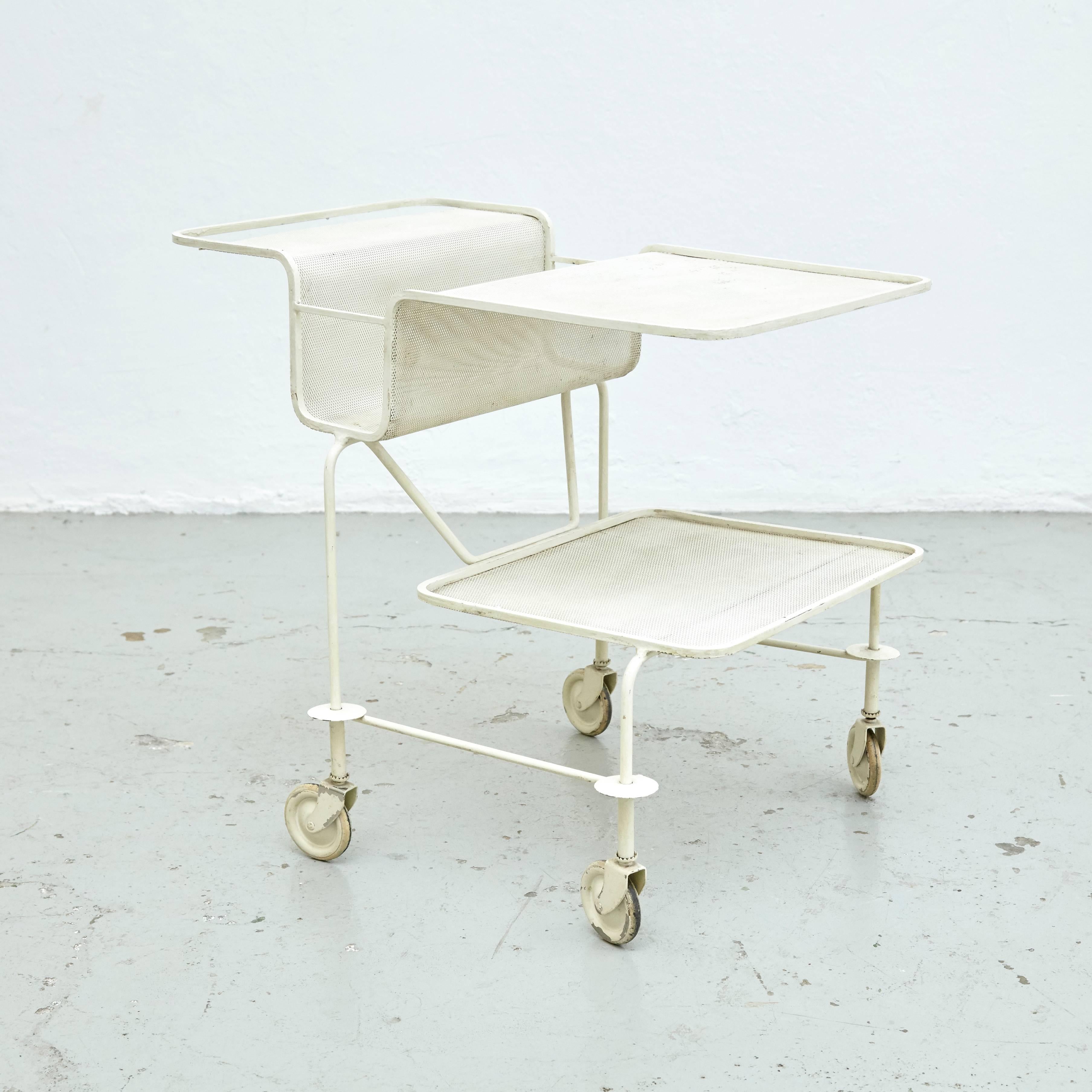 Trolley designed by Mathieu Matégot. 
Manufactured by Ateliers Matégot (France), circa 1950. 

Folded, perforated metal lacquered in white. 

In original condition, with minor wear consistent with age and use, preserving a beautiful patina,